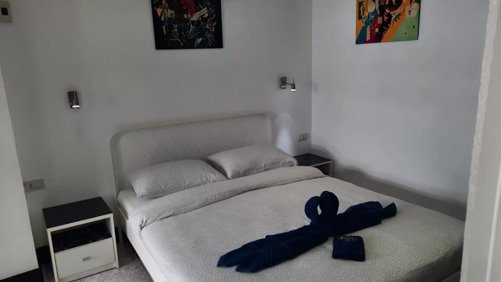 Photo of the whole room, Bed in Swiss Food Restaurant and room for rent