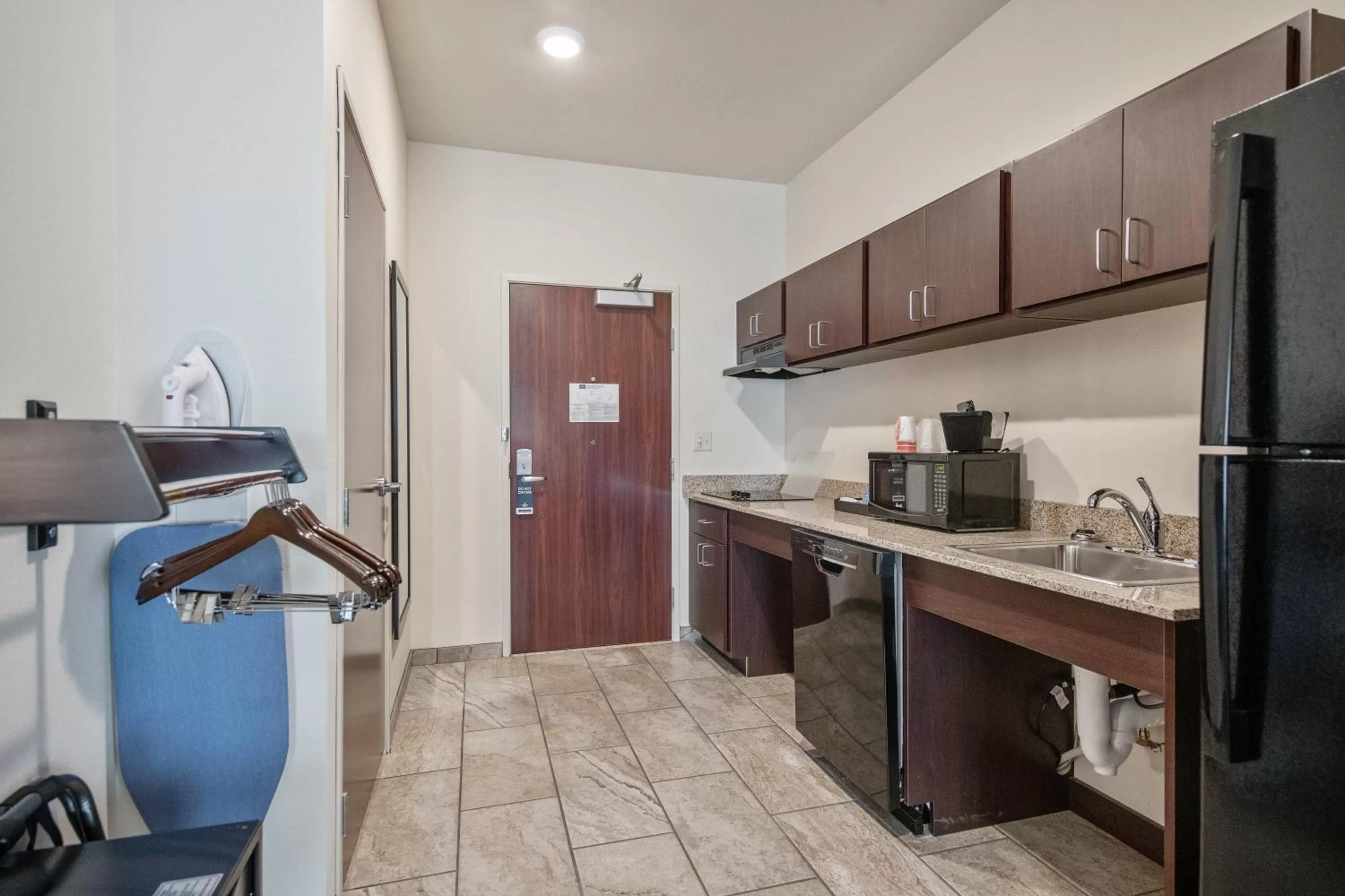 Kitchen or kitchenette in Cobblestone Hotel & Suites - Austin