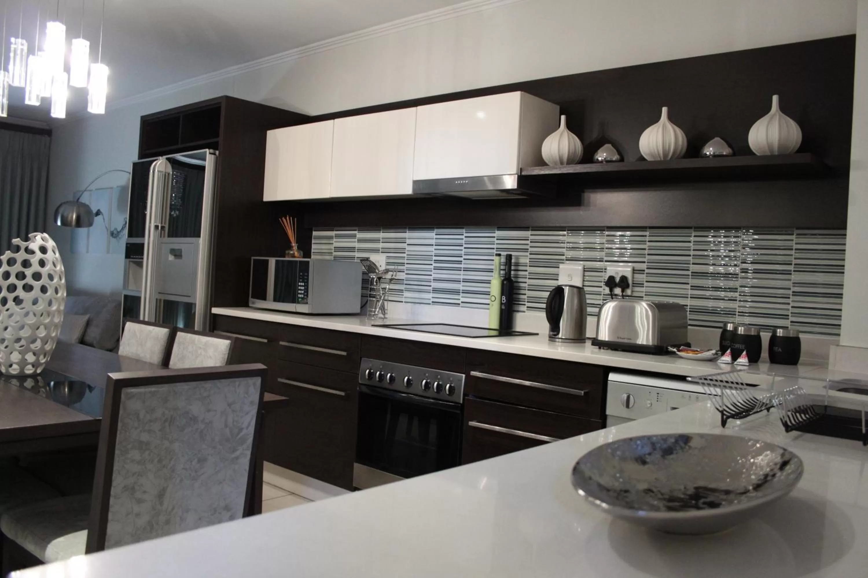 Kitchen or kitchenette in The Nicol Hotel and Apartments