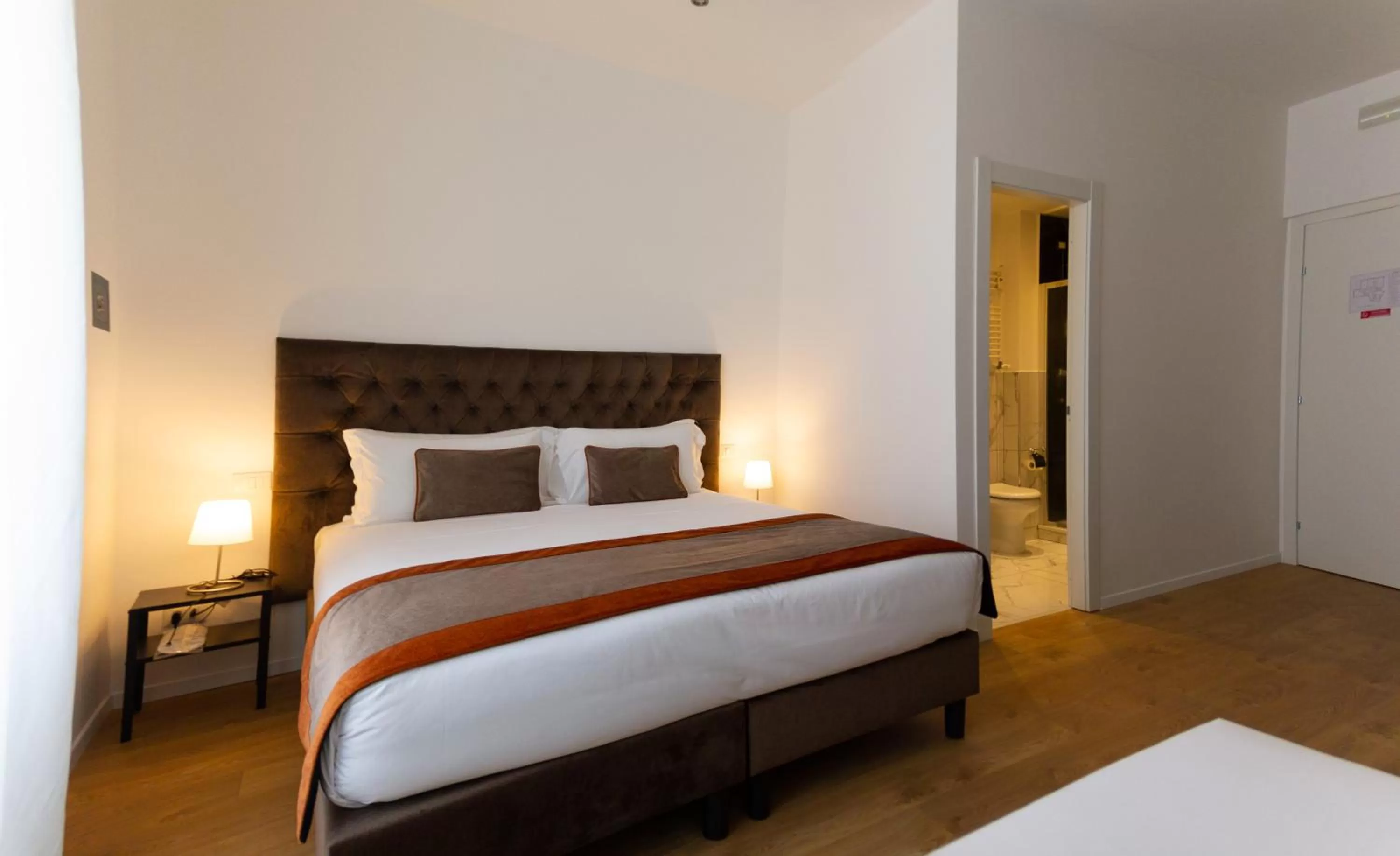 Bed in Michelangelo Vatican Rooms