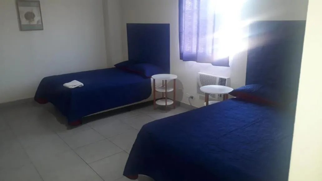 Photo of the whole room, Bed in Express Inn PTY Aeropuerto Internacional Panama