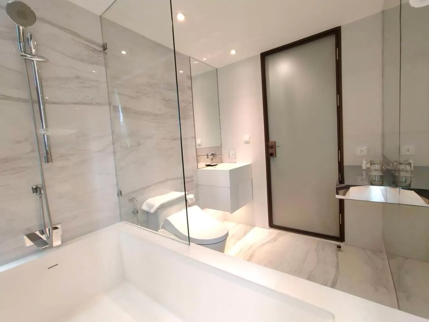 Bathroom in ashley hotel bkk