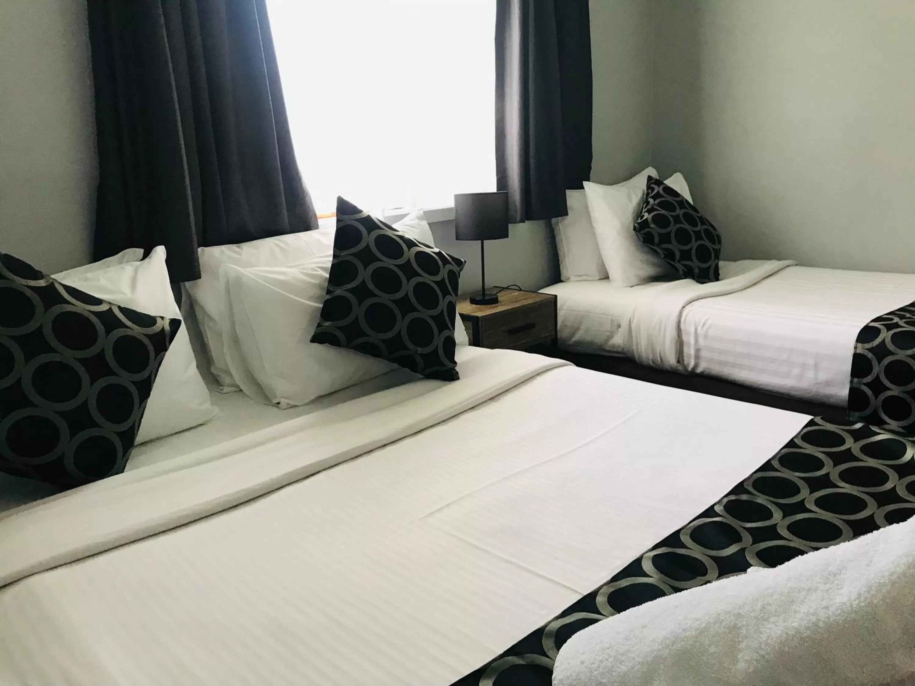 Bed in Jumbuck Motor Inn