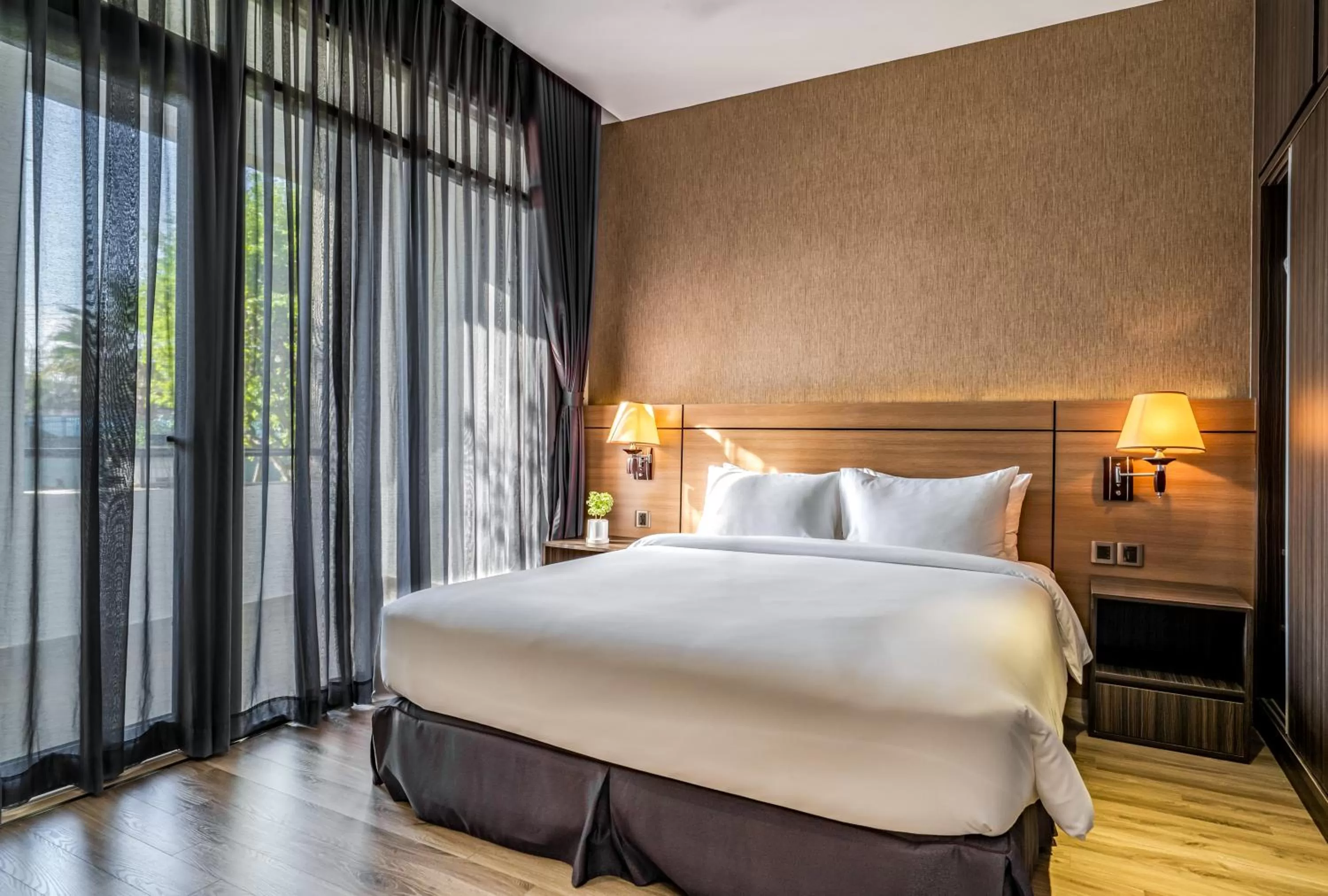 Bed in The Cap Hotel