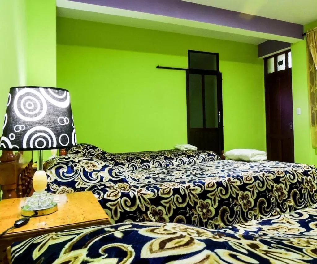 Bed in El Grano De Oro Hotel