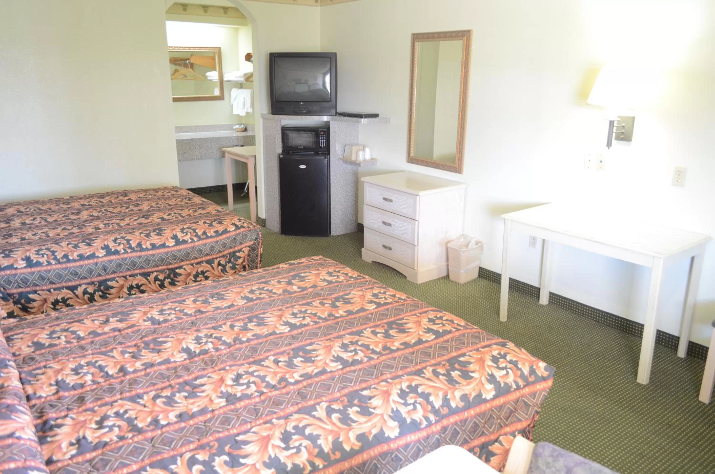 Bedroom, Bed in Scottish Inn and Suites NRG Park/Texas Medical Center - Houston