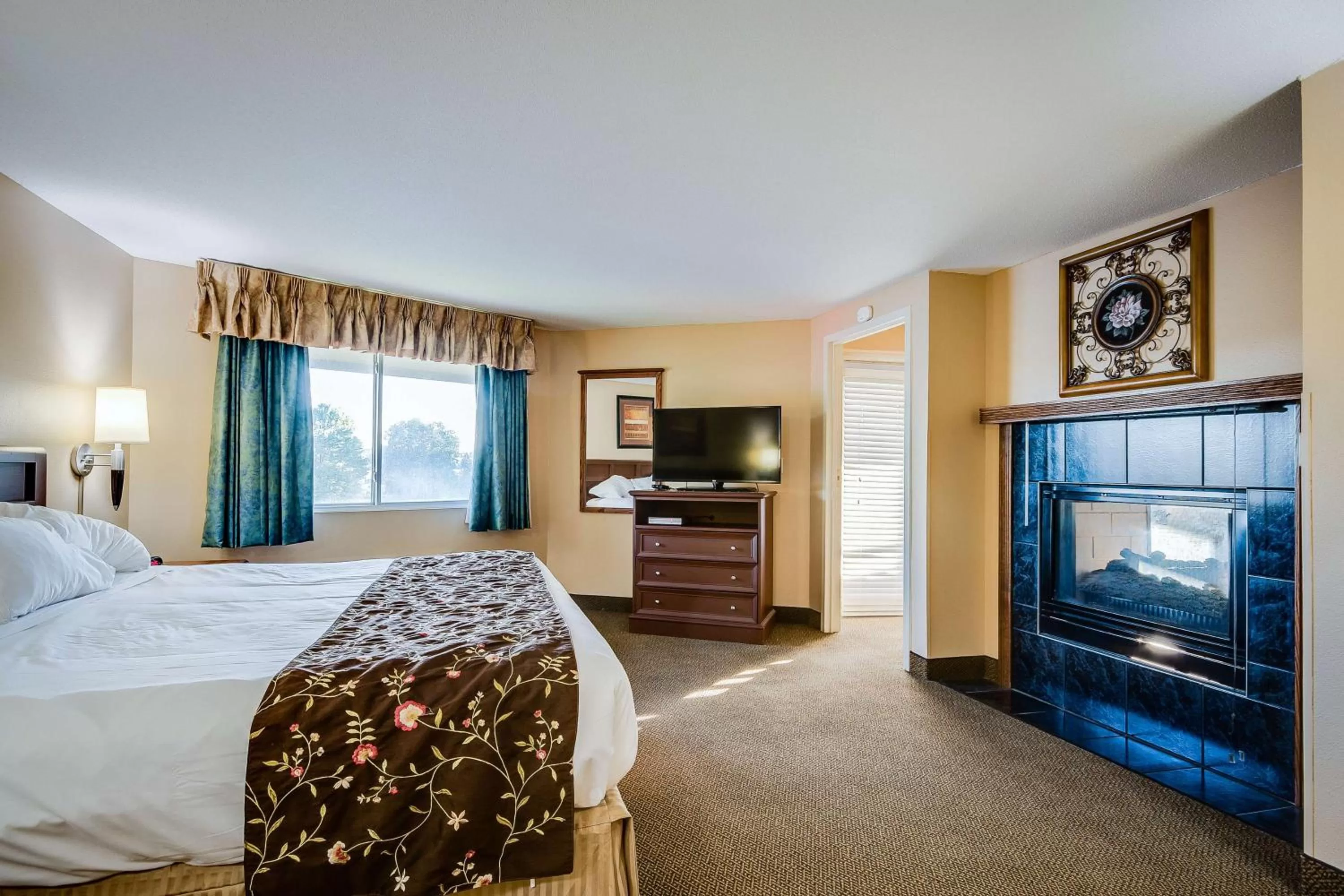 King Suite with Sofa Bed and Terrace in SureStay Plus Hotel by Best Western Black River Falls