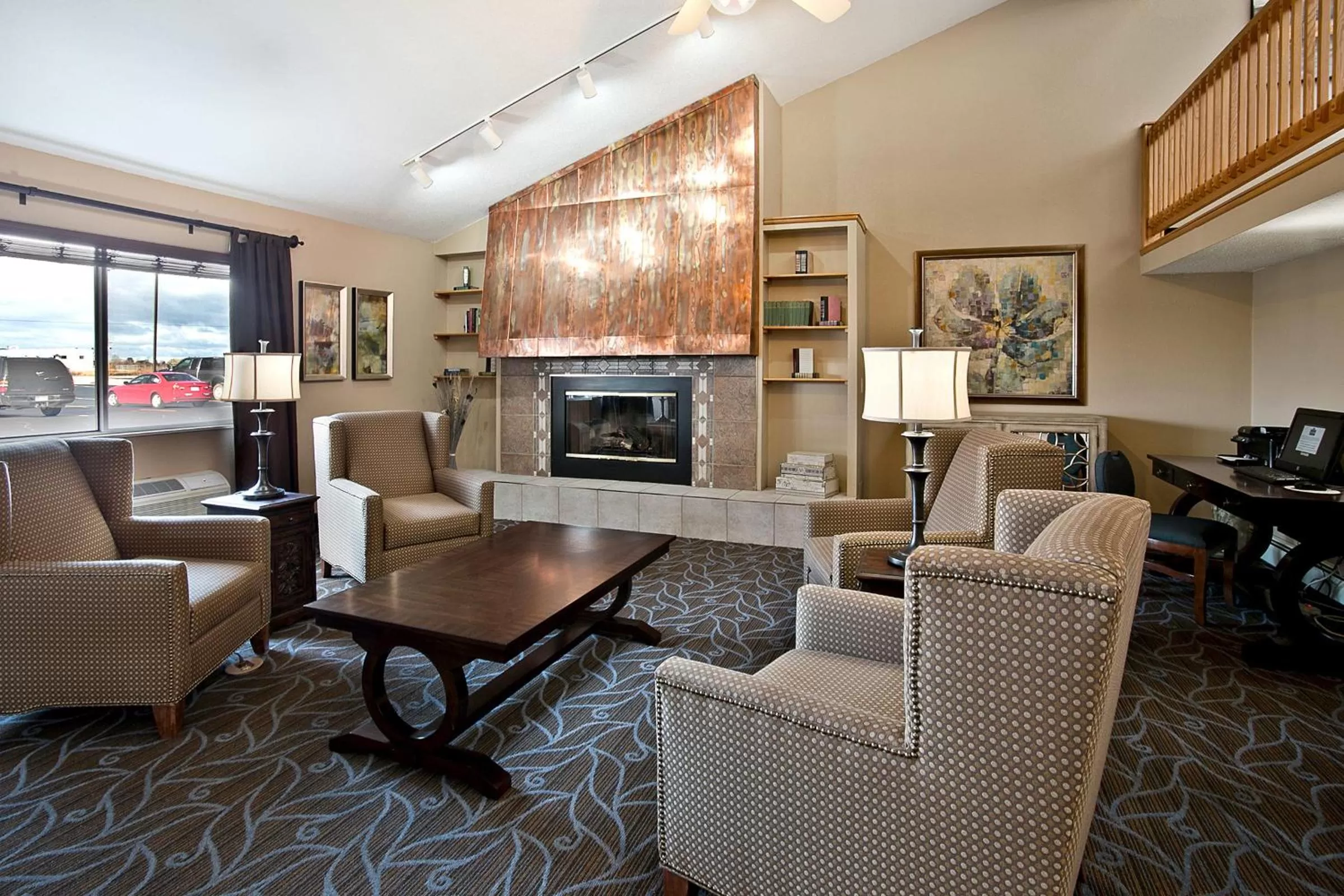 Lobby or reception in AmericInn by Wyndham Bay City