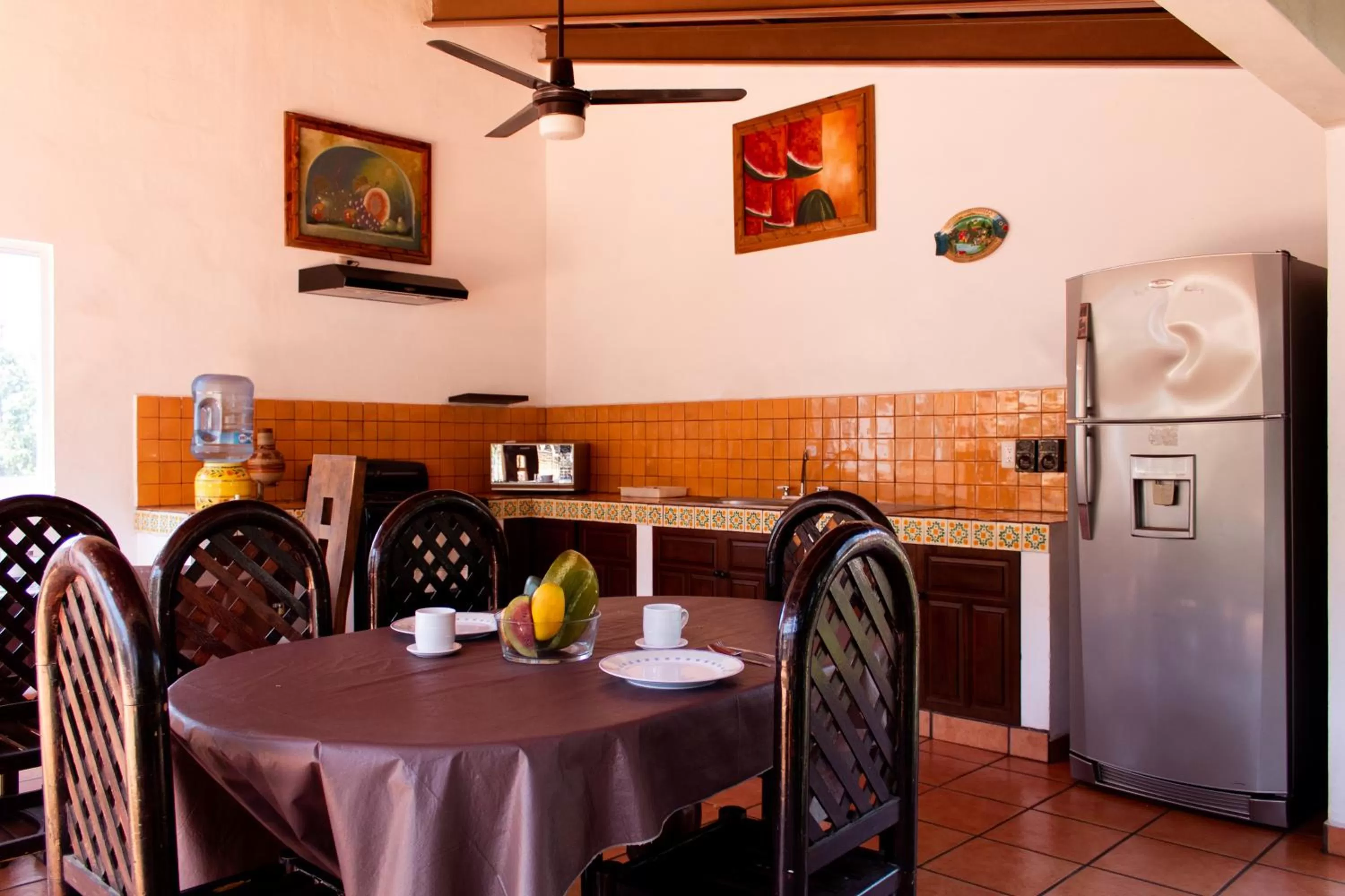 Communal kitchen in Hotel Posada De Roger - Near Los Muertos Beach