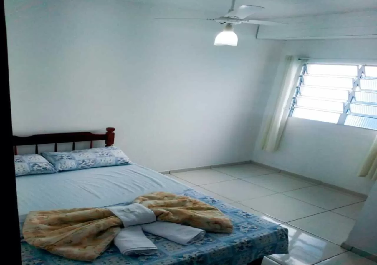 Bed in Pousada Brasil - Self Check-in