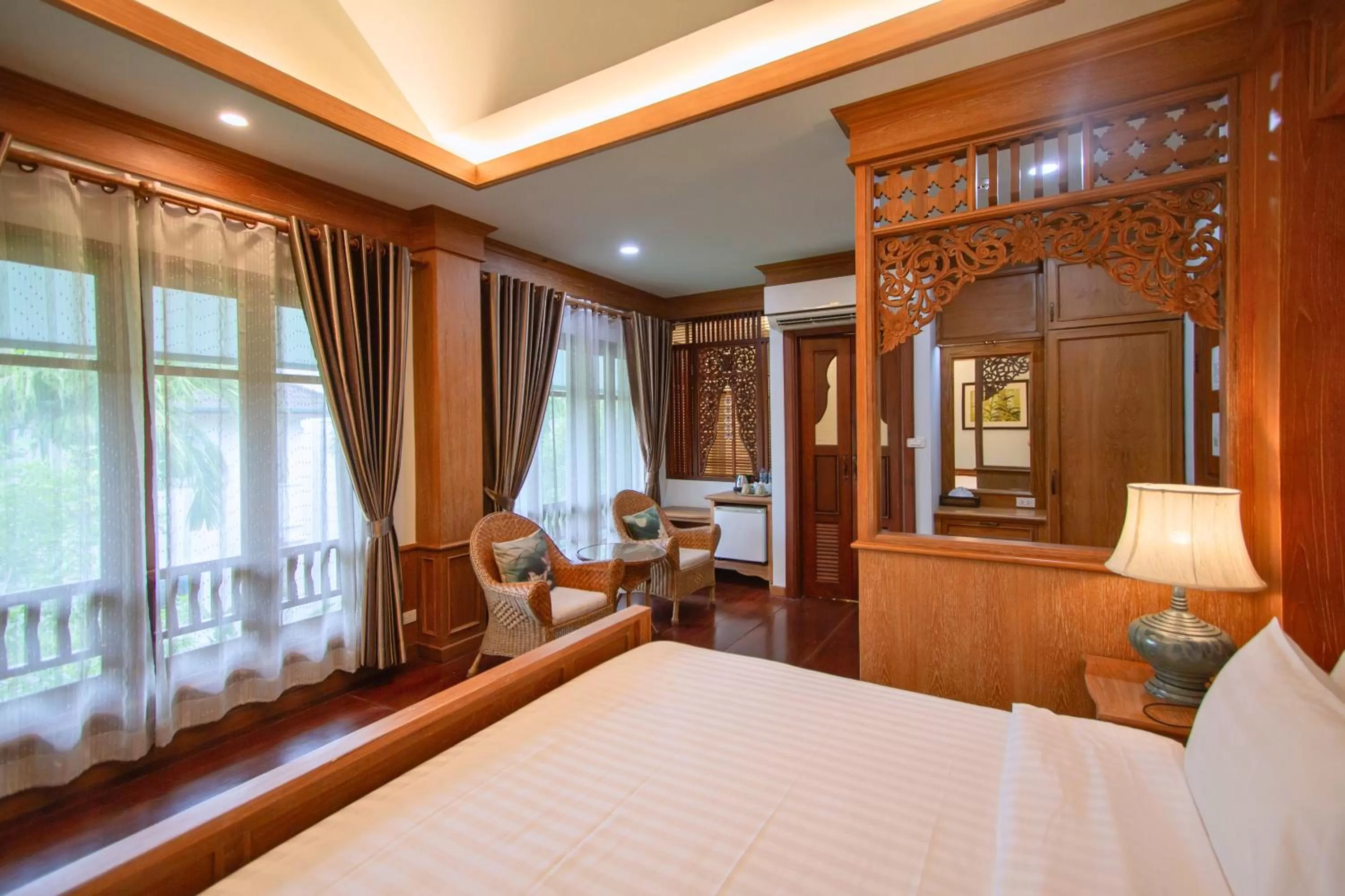 Bed in Rich Garden House Hotel