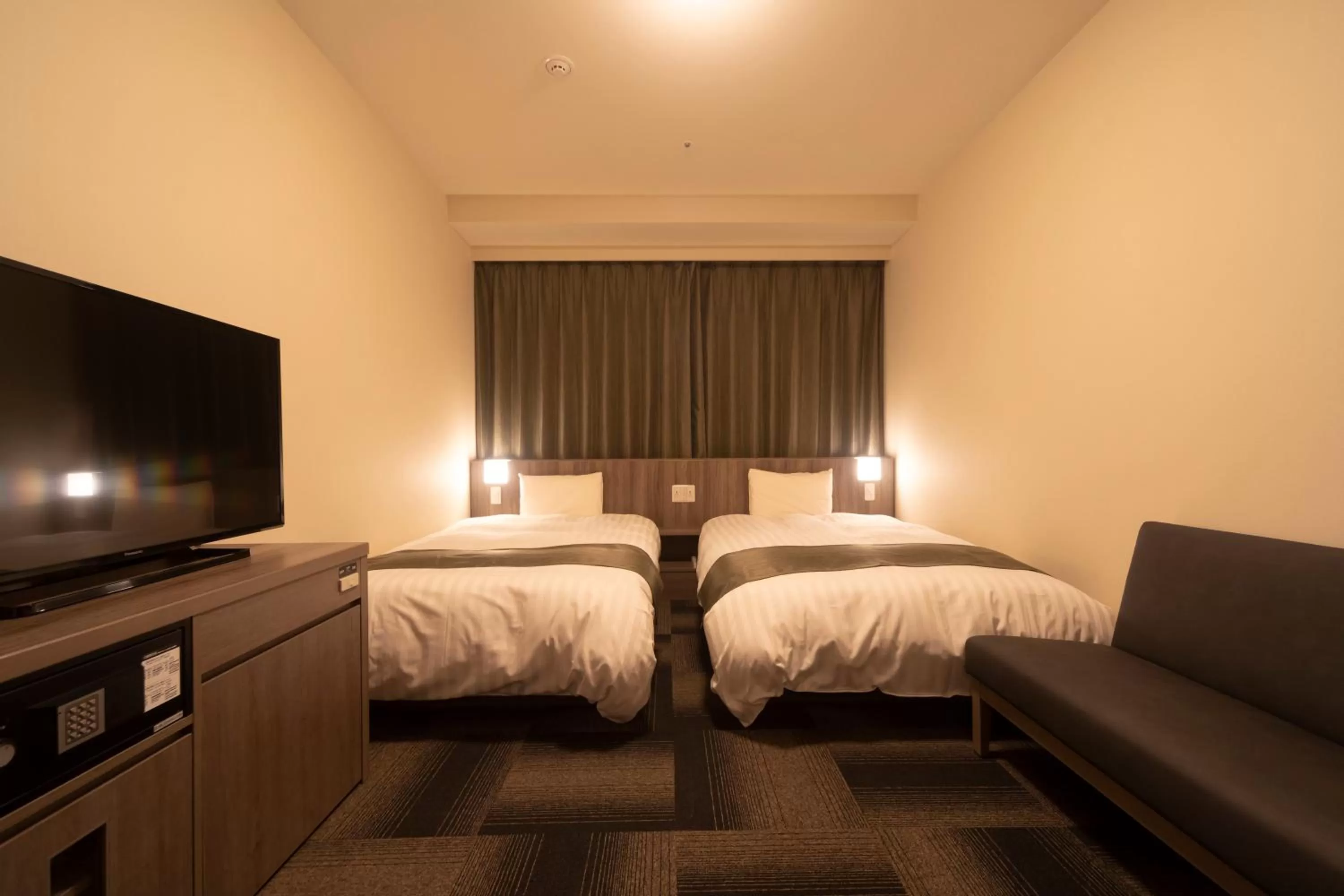 Bed in Dormy Inn Korakuen