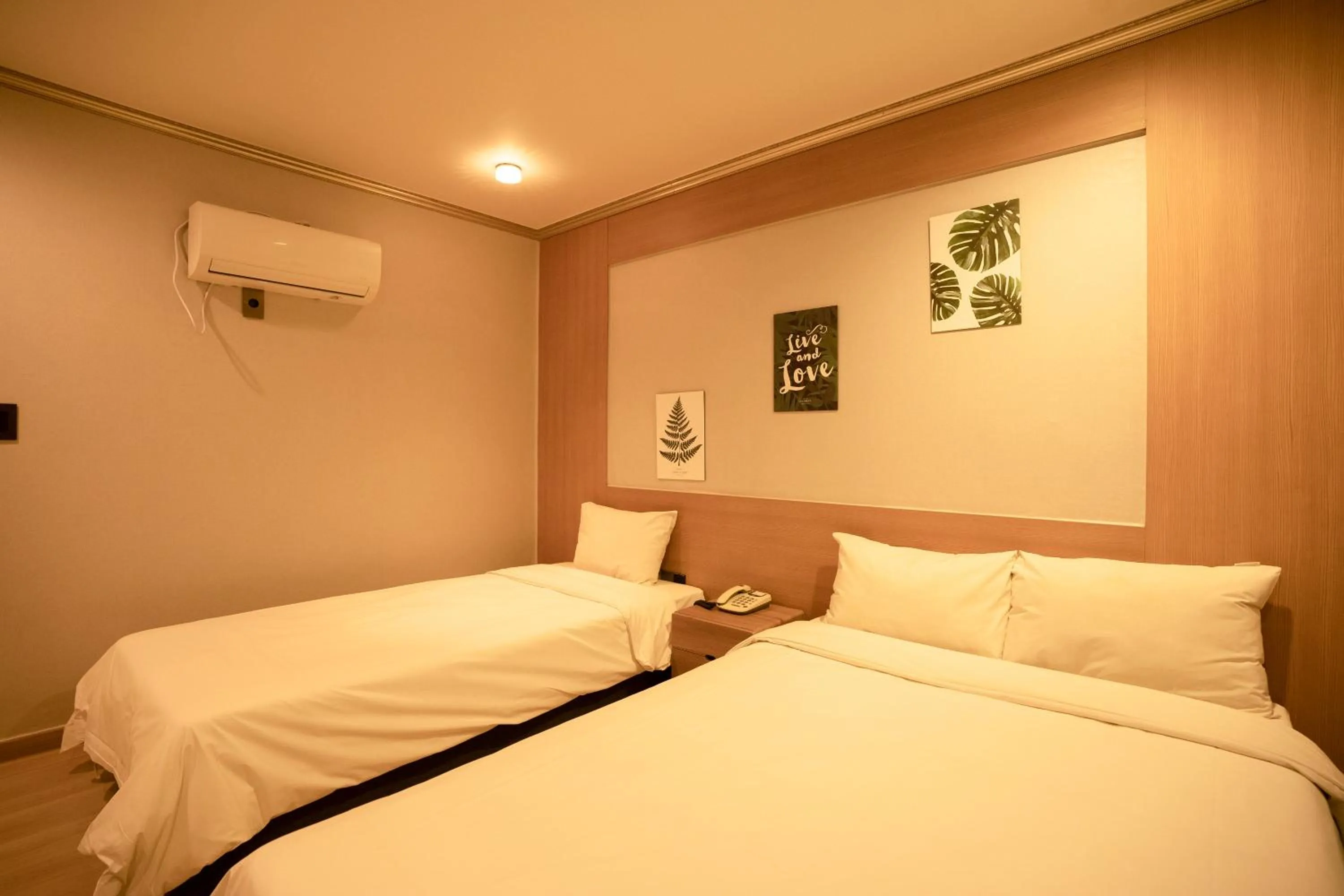 Bed in Jeju Stay Hotel