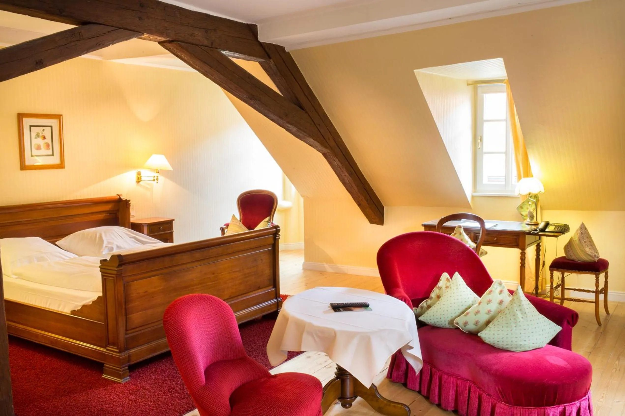 Photo of the whole room, Bed in WAGNERS Hotel Greifen-Post