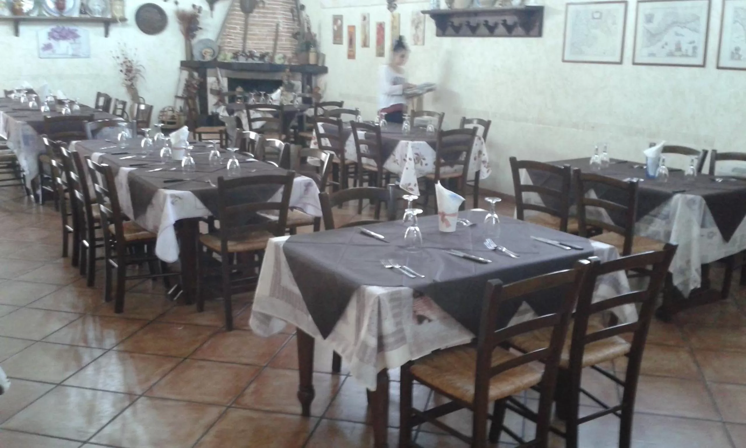 Communal lounge/ TV room in Oasi del Lago