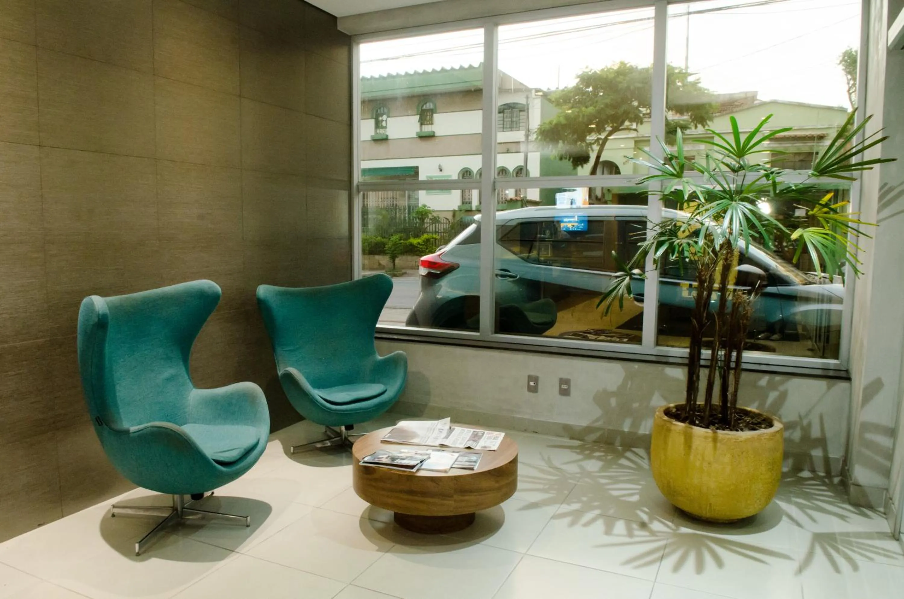 Lobby or reception in Ímpar Suítes Expominas