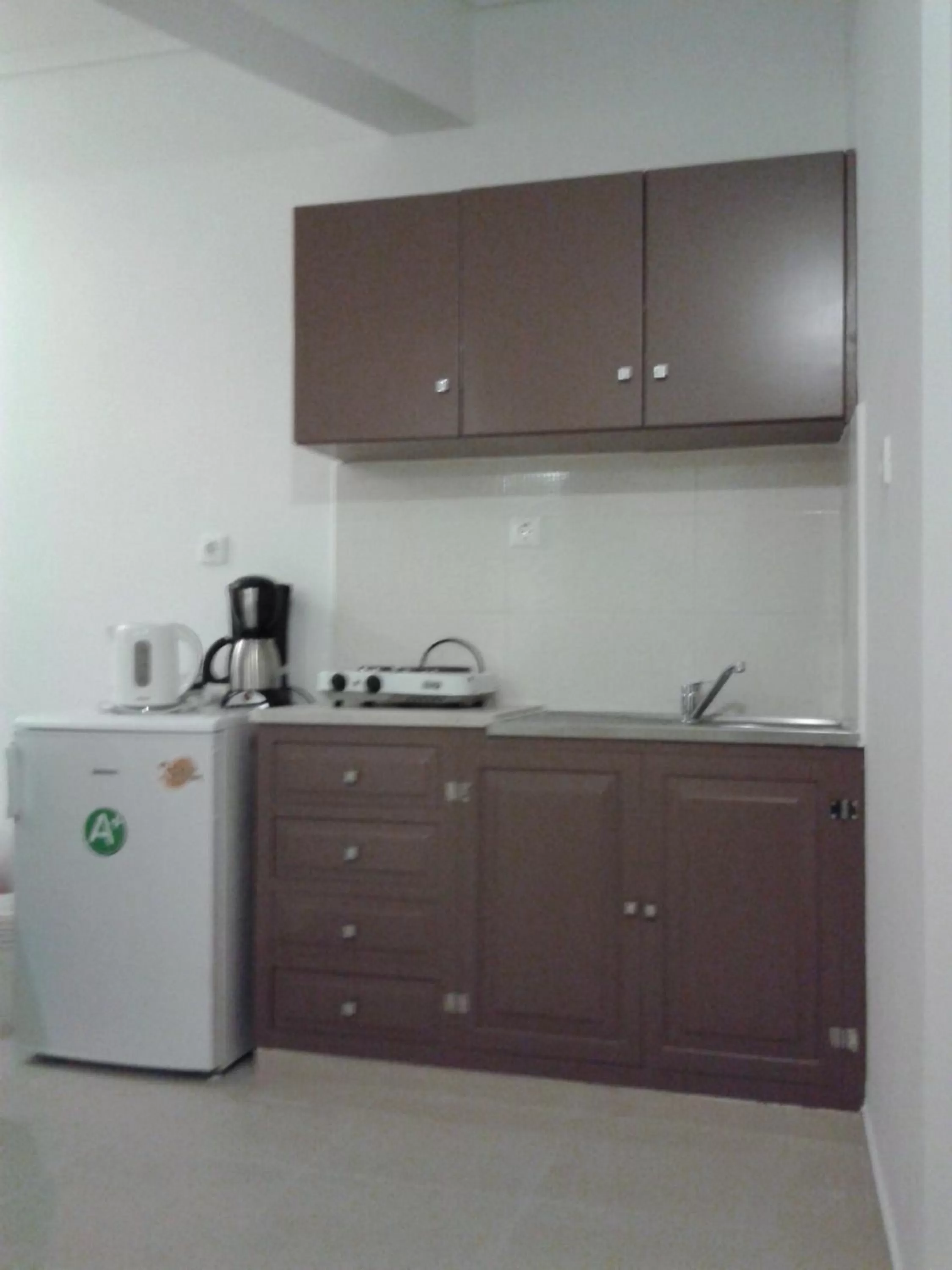 Kitchen or kitchenette in Fantasia Hotel Apartments
