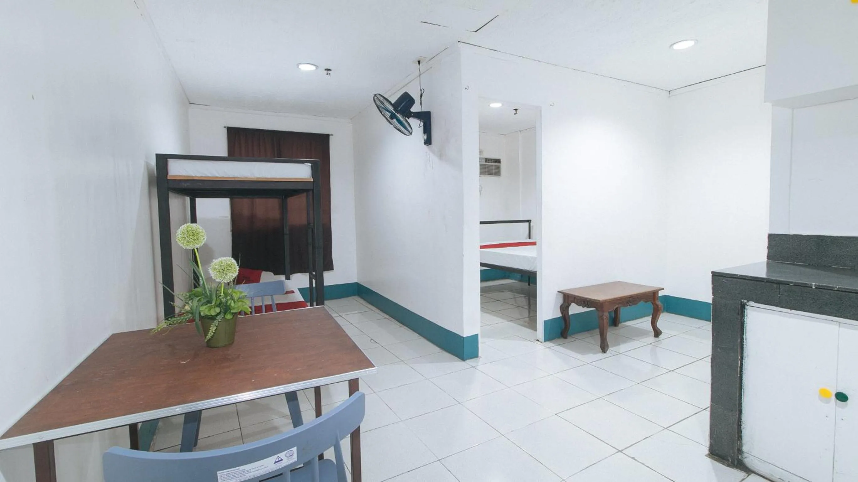 Seating area in RedDoorz at Crowne One Condo