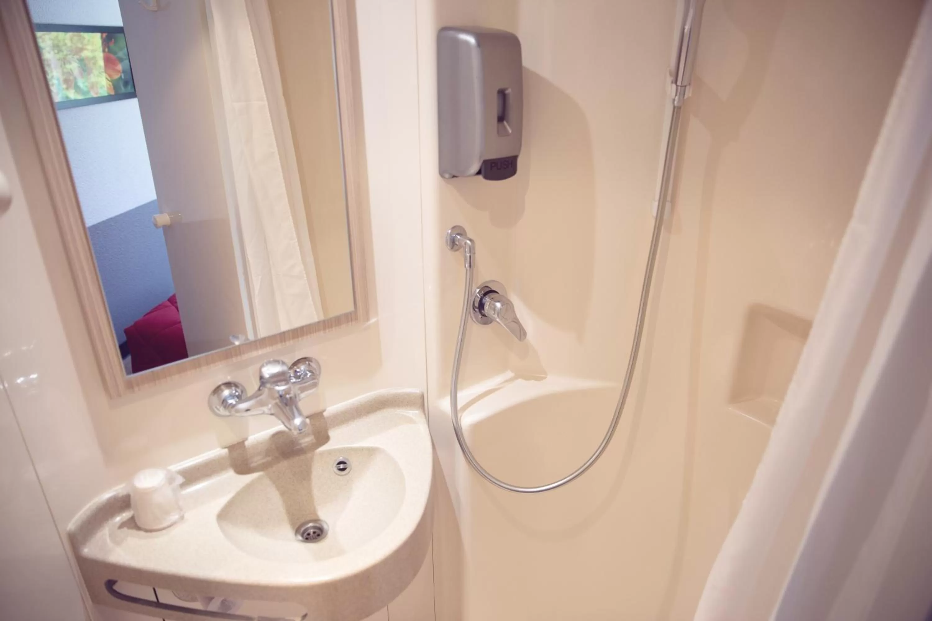 Shower in Premiere Classe Roissy Aéroport Charles De Gaulle