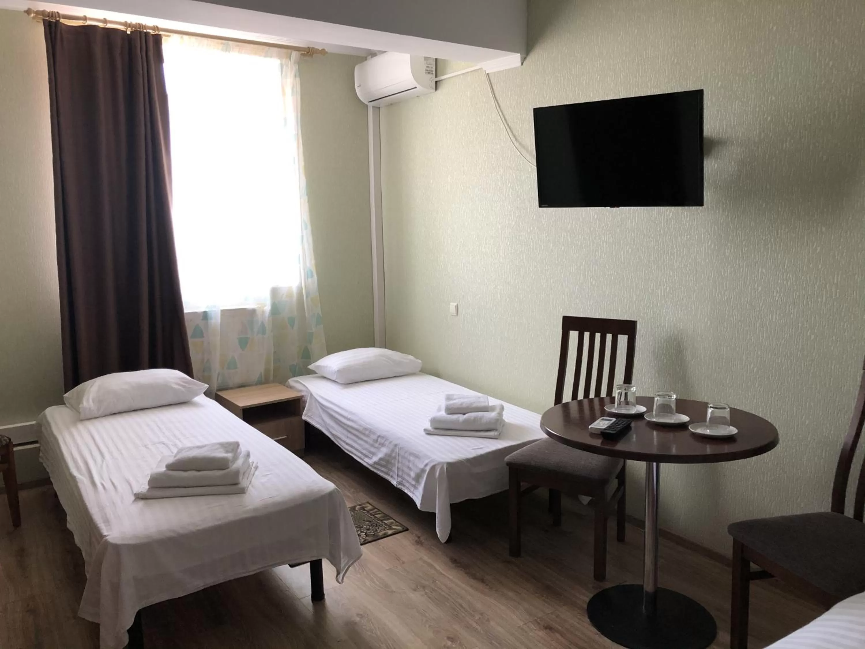 Bed in Zhuliany City Hotel