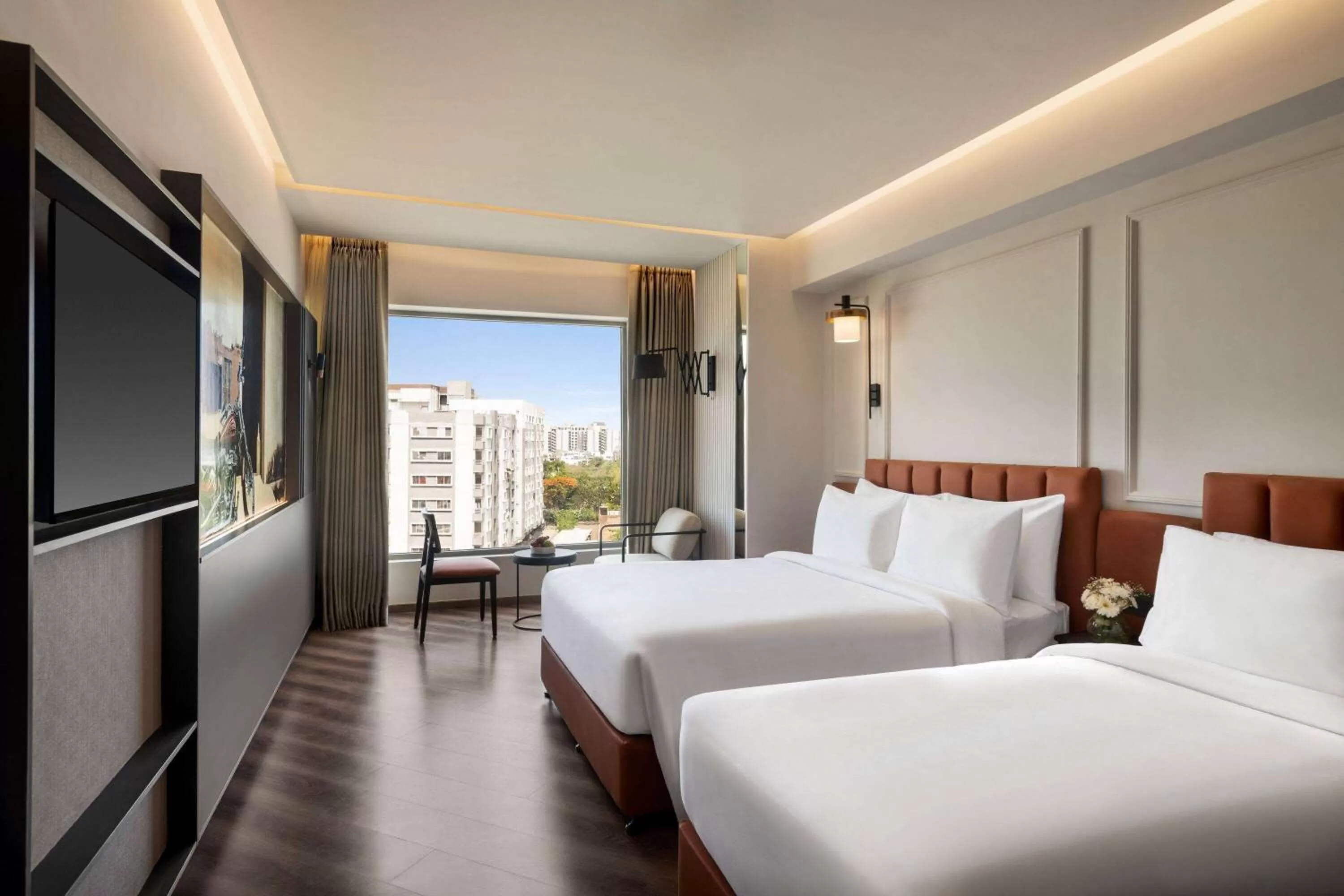 Bed in Ramada Encore by Wyndham Indore Nipania