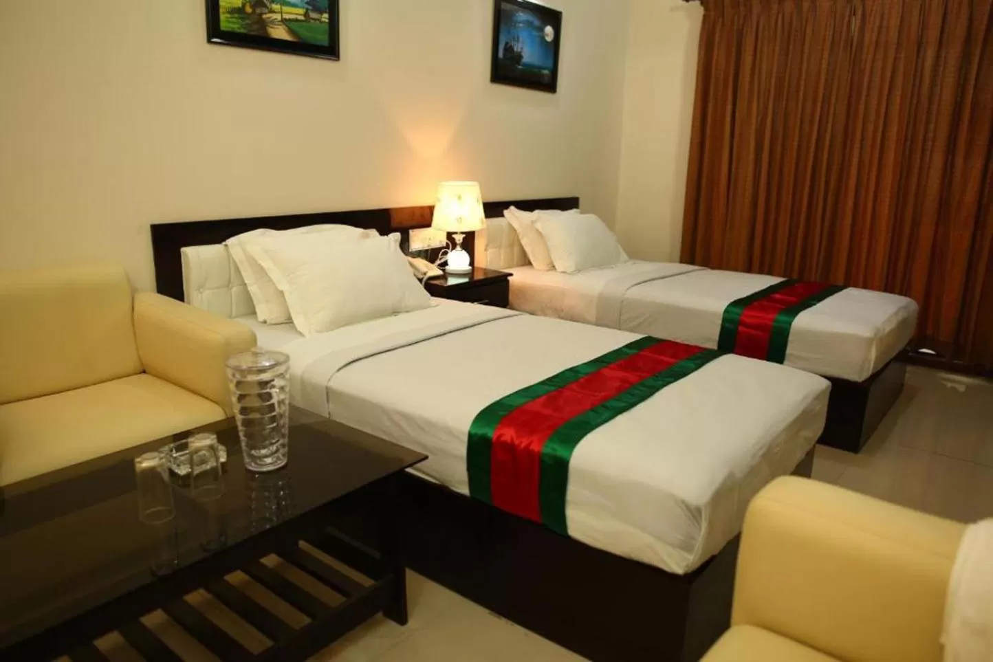 Photo of the whole room, Bed in Central Inn Dhaka City Centre