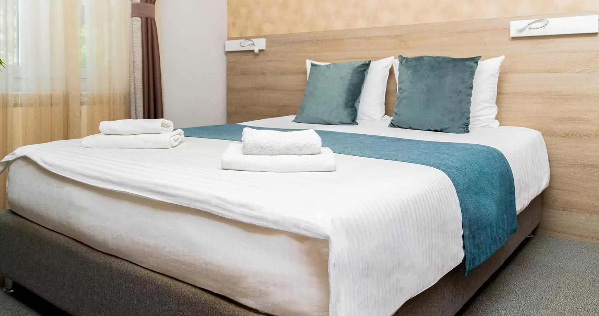 Photo of the whole room, Bed in Garni Hotel Mint