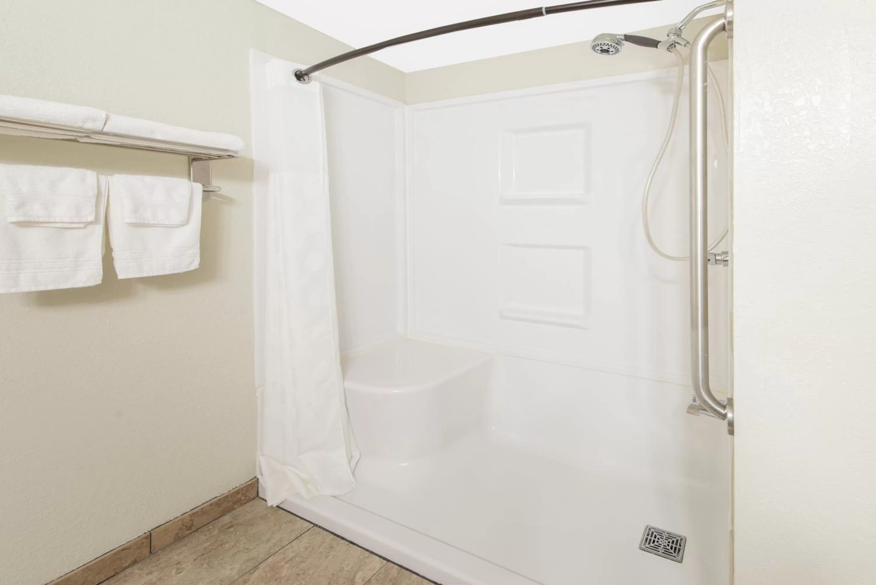 Bathroom in Super 8 by Wyndham Moberly MO