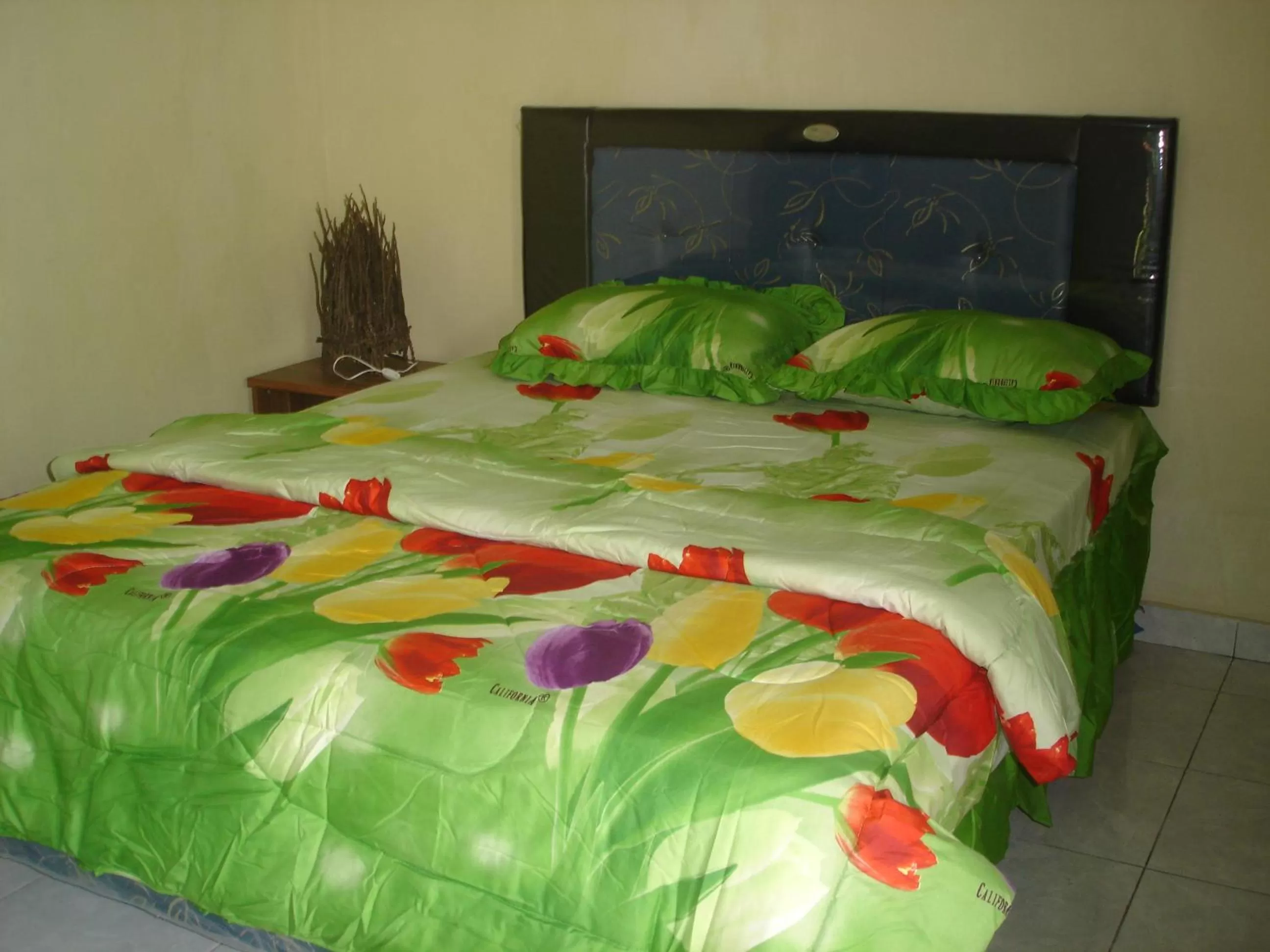 Bed in Penginapan Sedap Malam