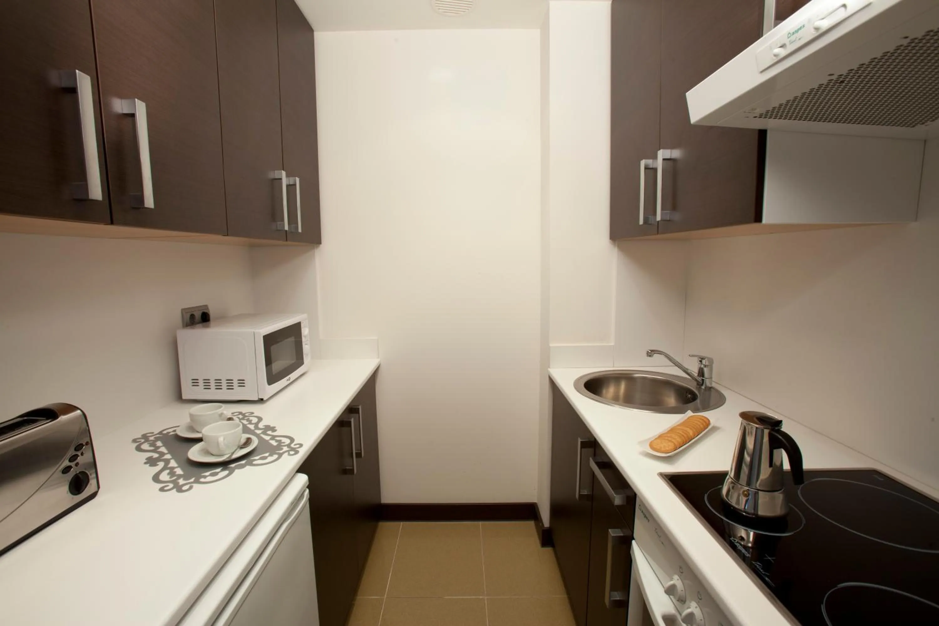 Kitchen or kitchenette in Aparthotel Attica21 As Galeras