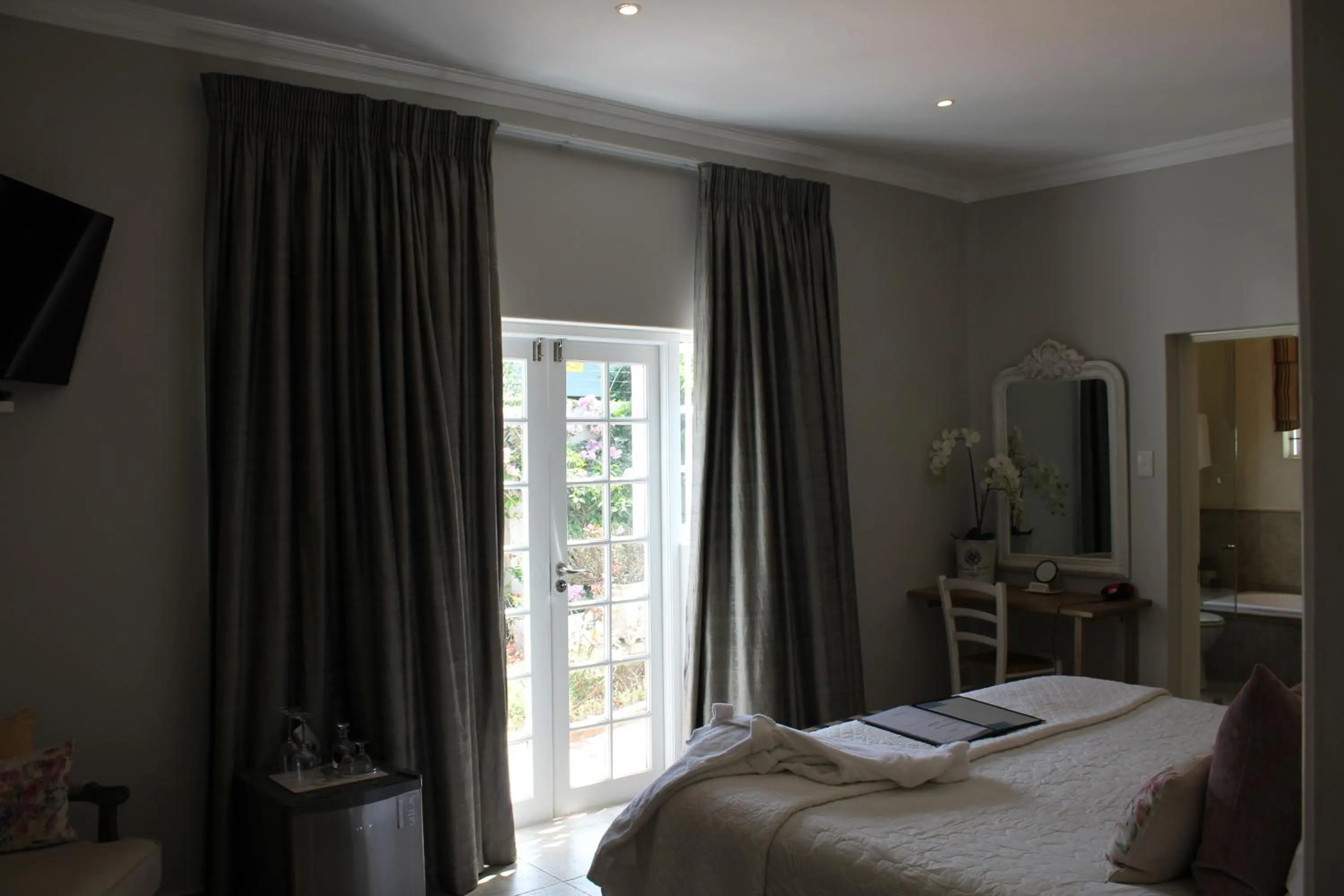 Garden view, Bed in Sandals Guest House