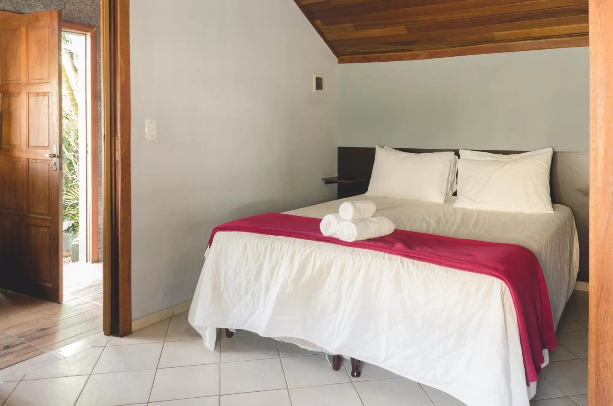 Bed in Pousada Ilha da Magia