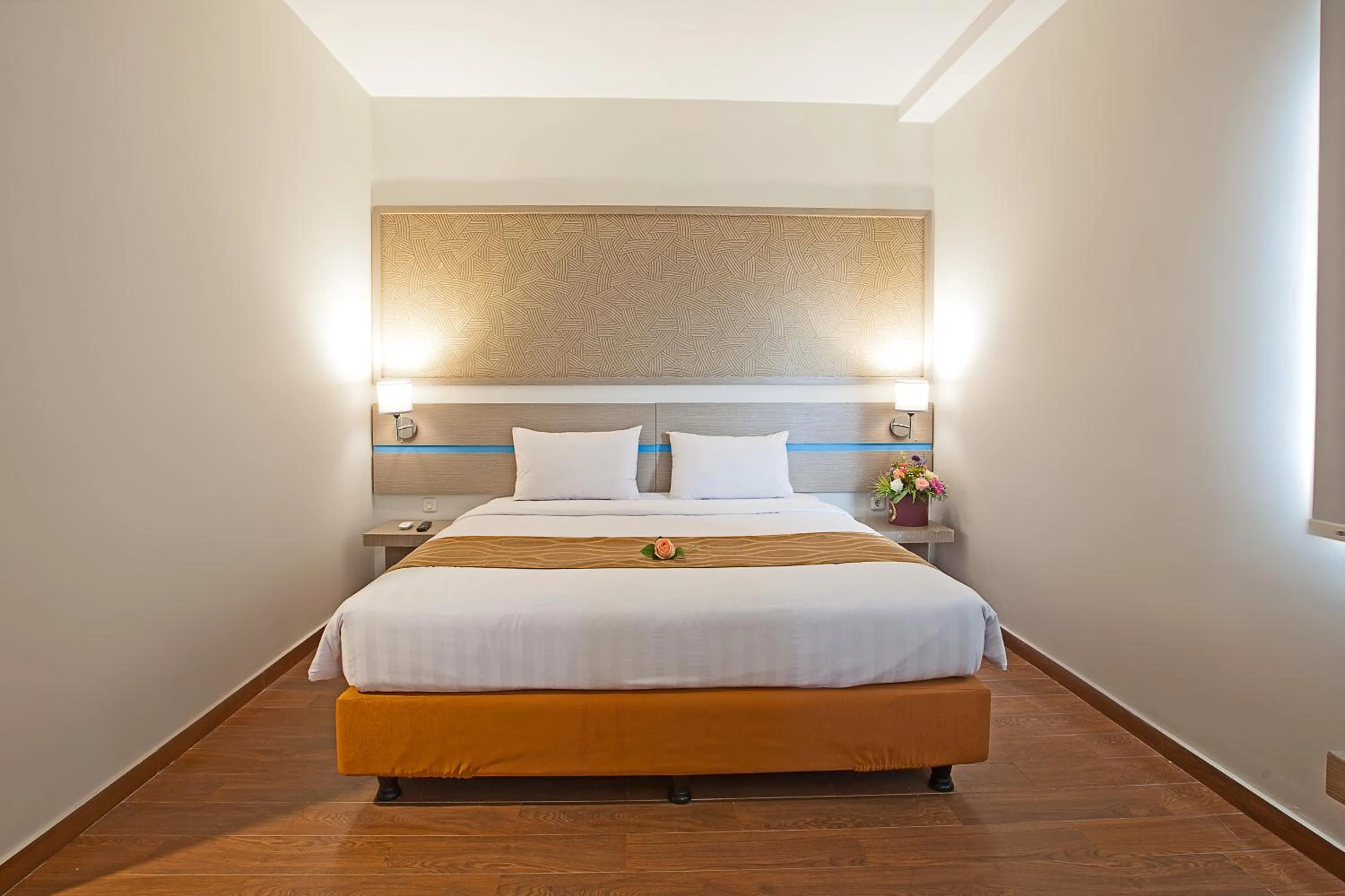 Bedroom, Bed in Genio Hotel Manado