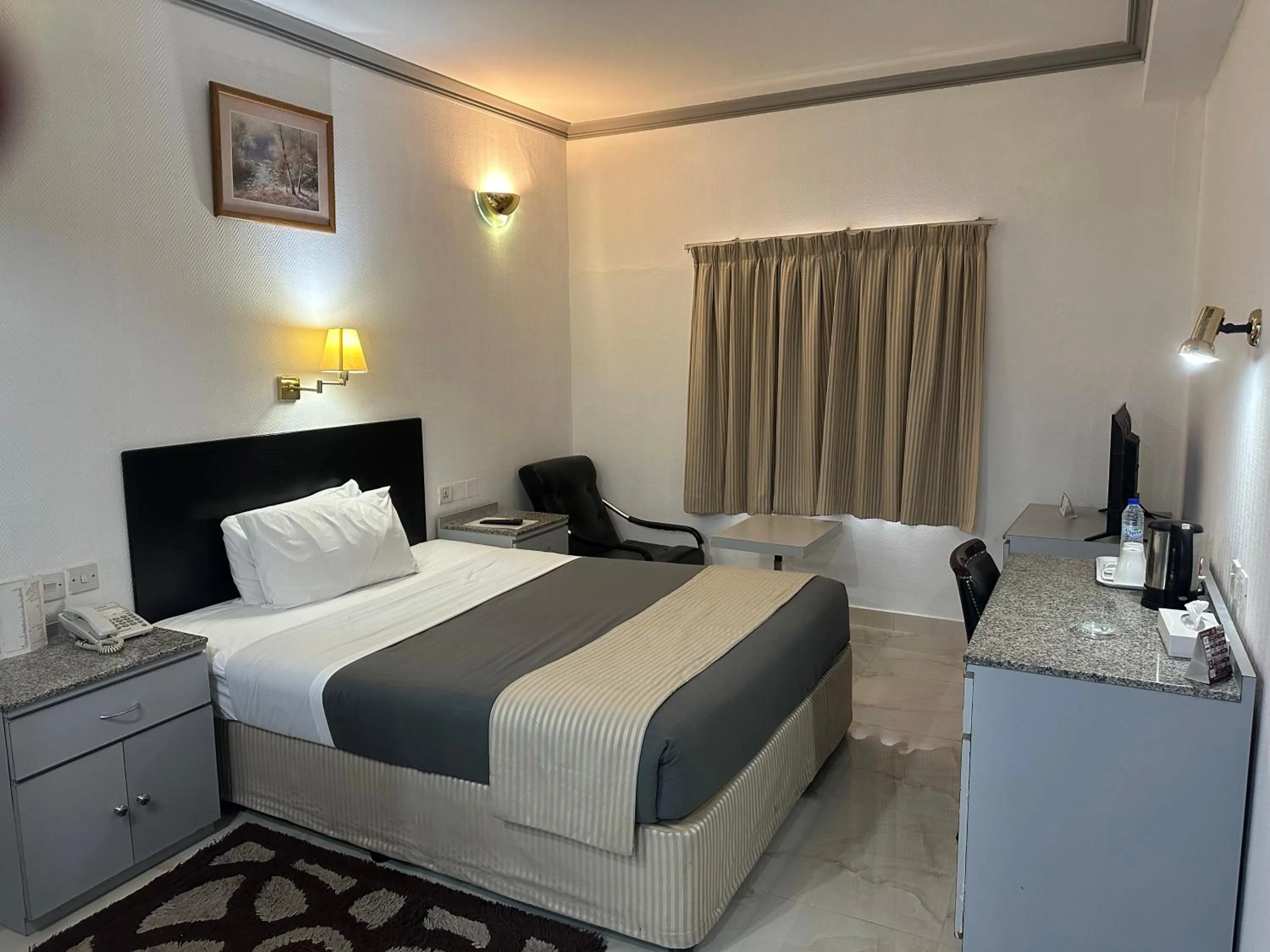 Bed in Grand Astoria Hotel