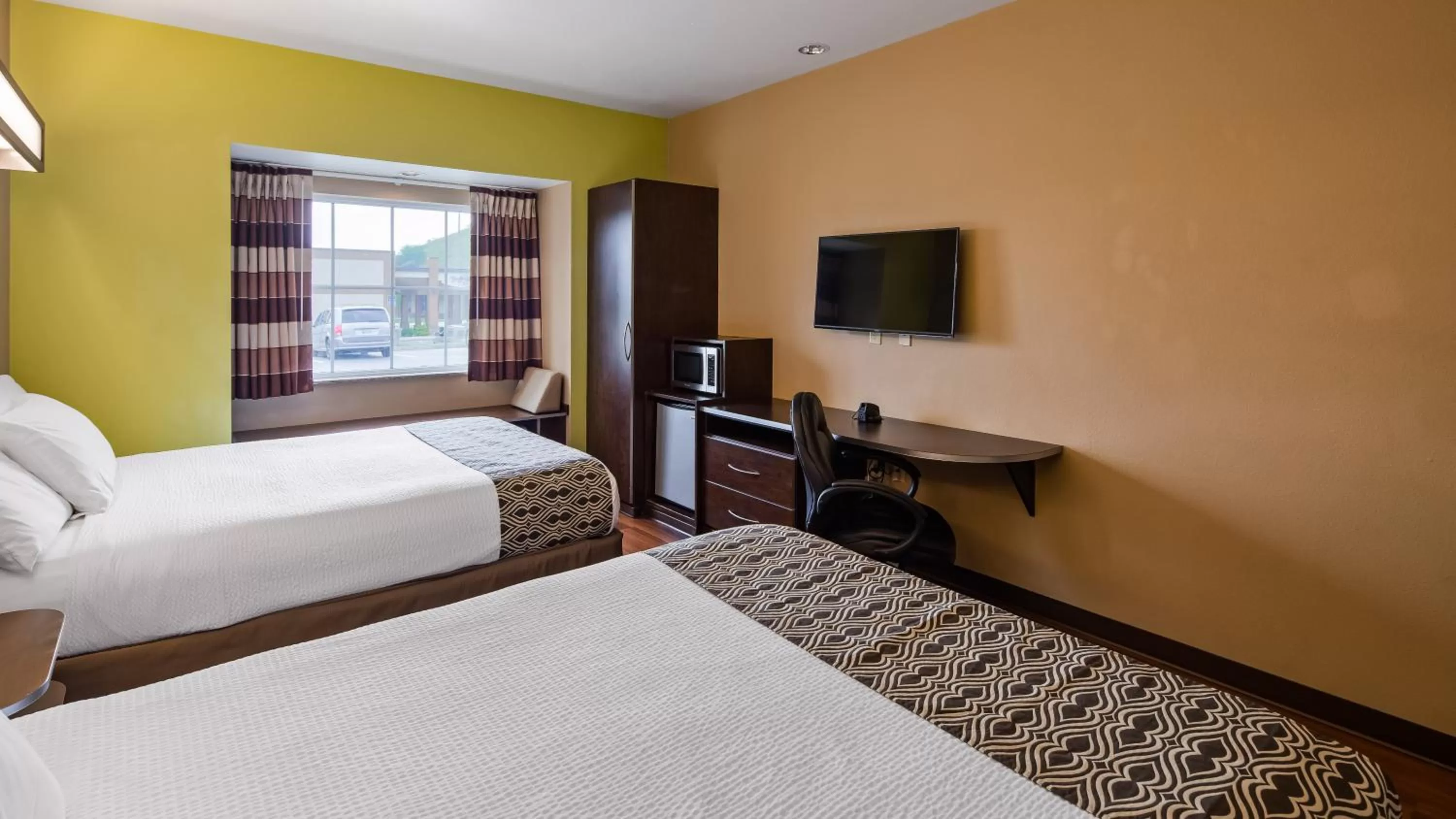 Bed in SureStay Plus Hotel by Best Western Buckhannon