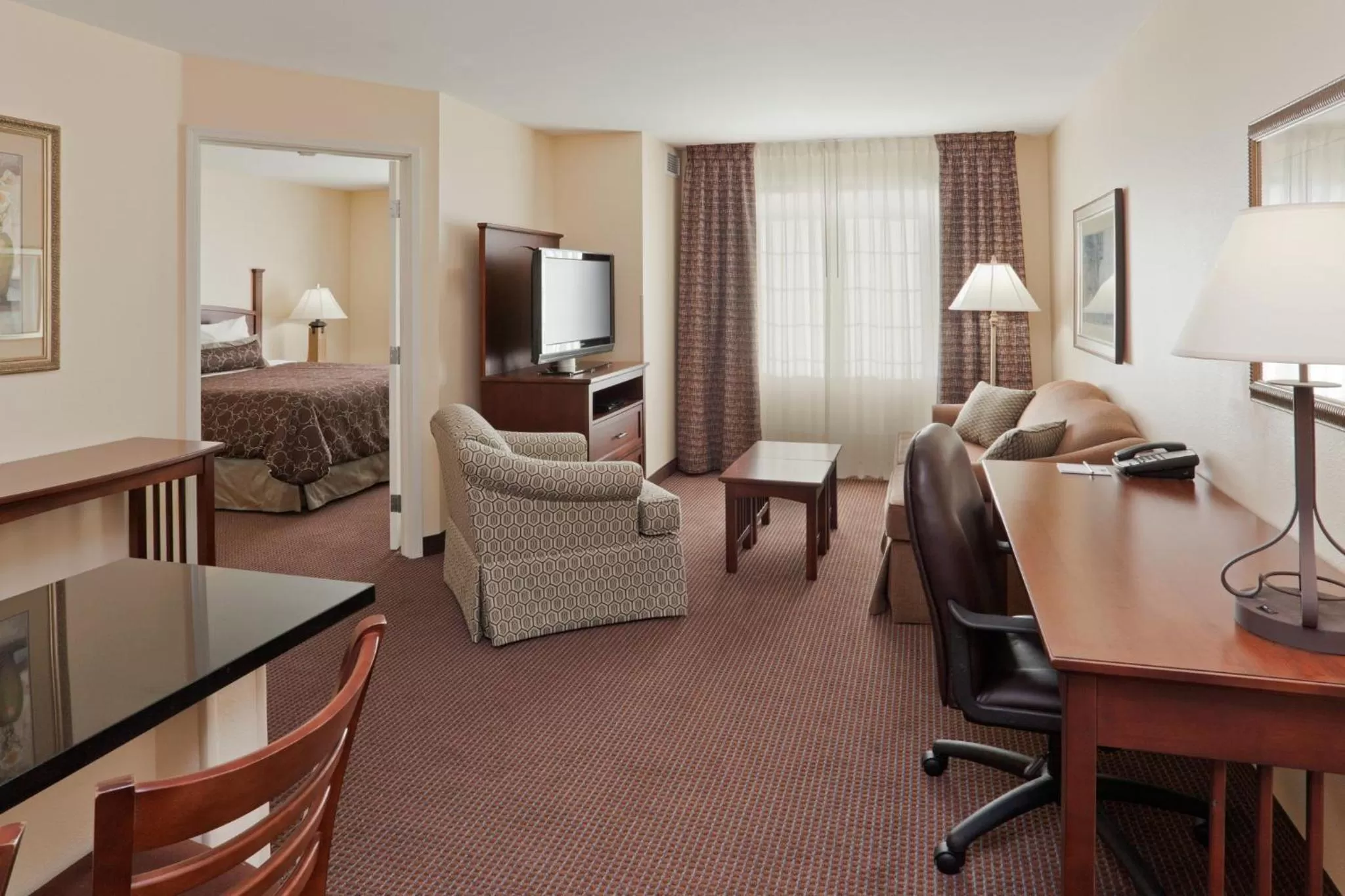 Photo of the whole room, Bed in Staybridge Suites Rocklin - Roseville Area by IHG