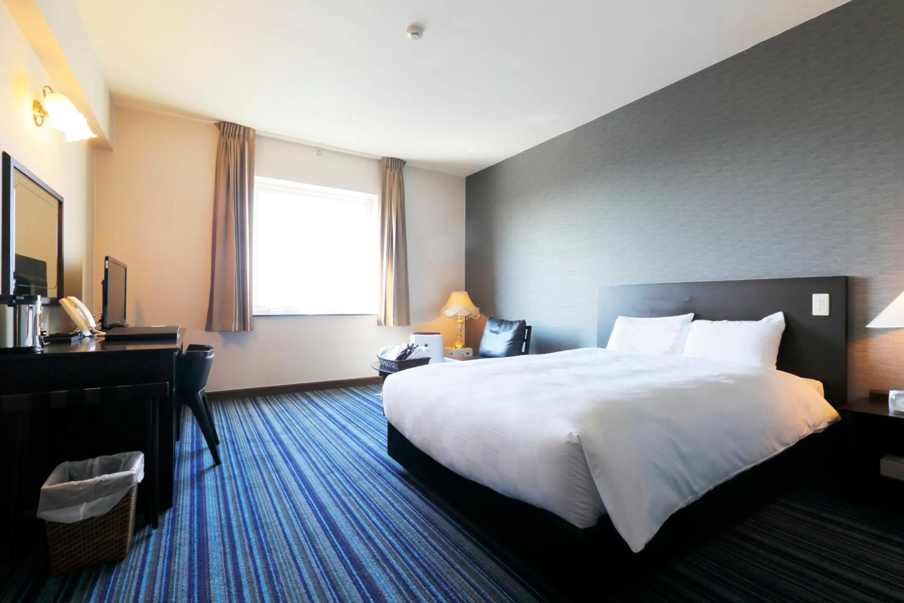 Photo of the whole room, Bed in Spring Sunny Hotel Nagoya Tokoname ekimae