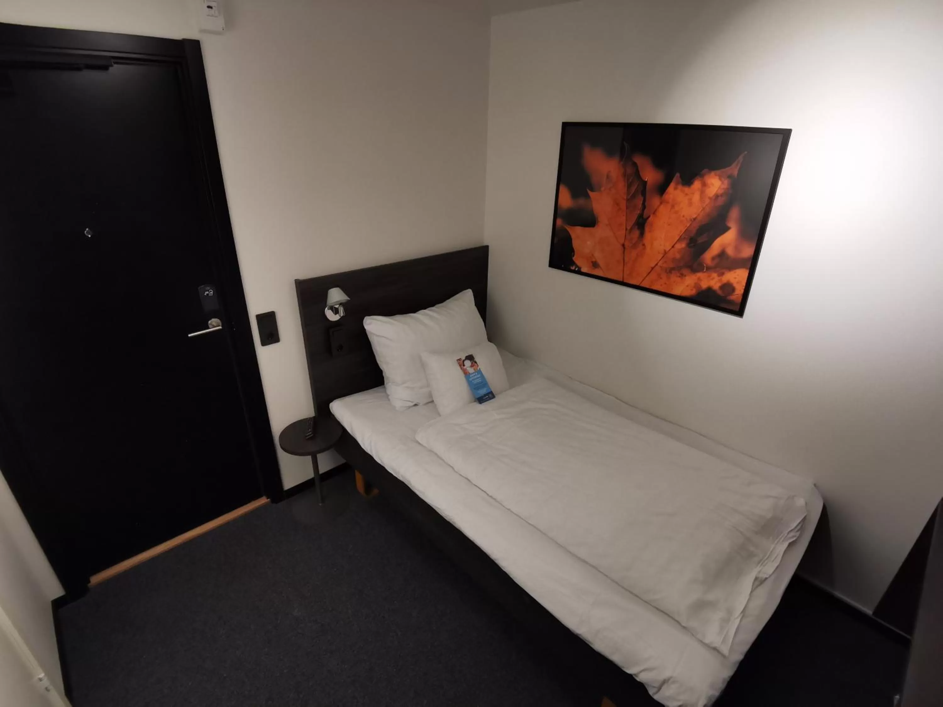 Bed in Clarion Hotel Sense