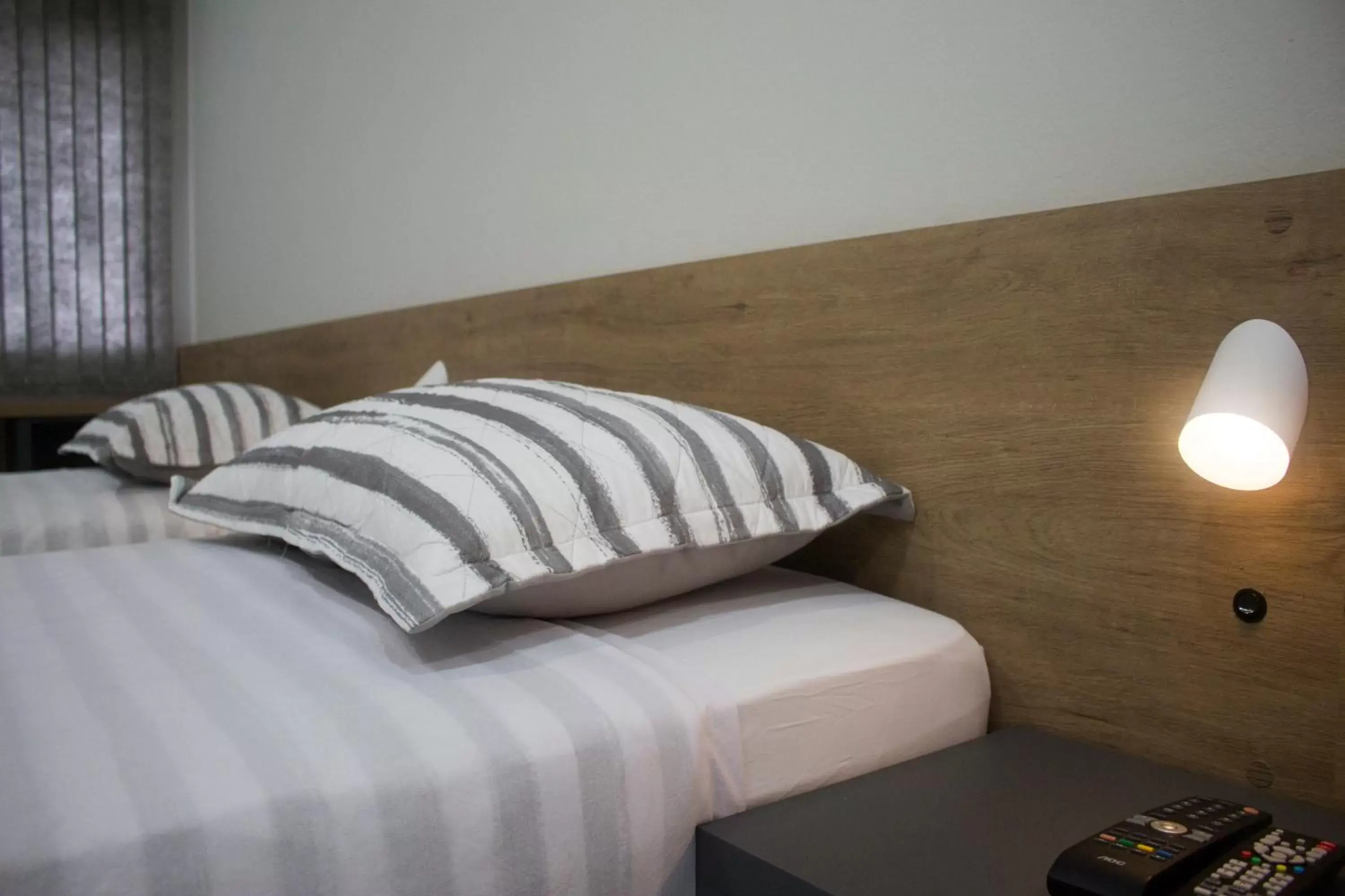 Deluxe Triple Room in Hotel Dois Irmãos Deluxe Triple Room in Hotel Dois Irmãos