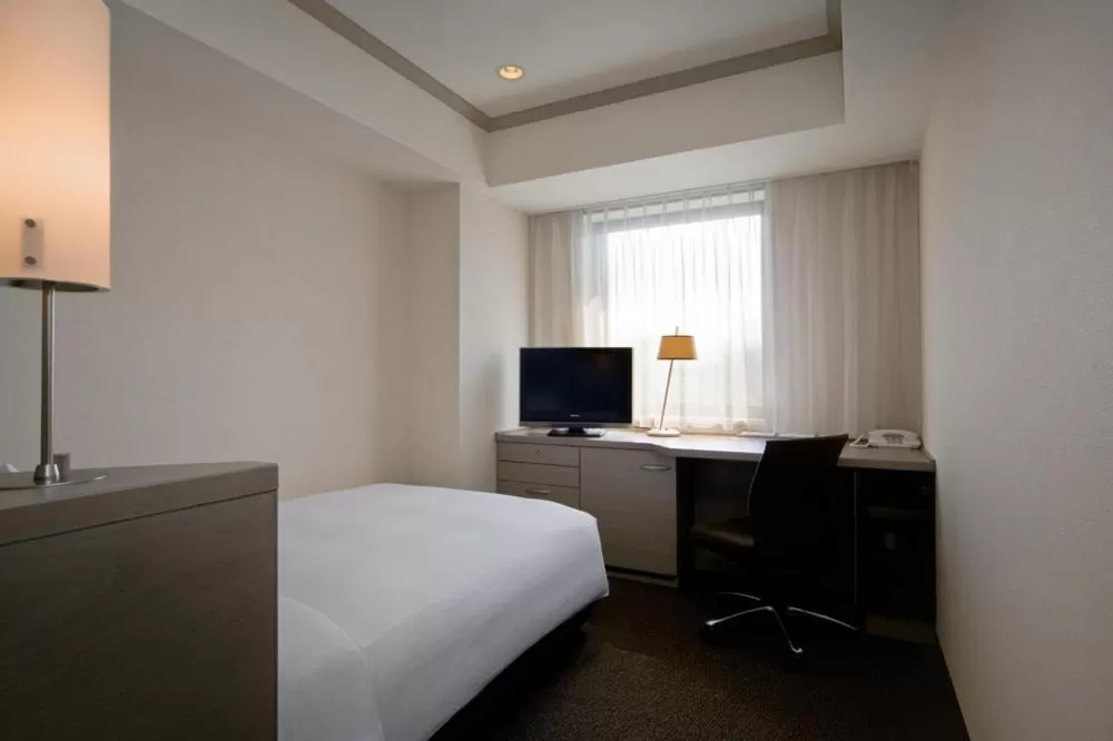 Bed in Hotel Nikko Fukuoka