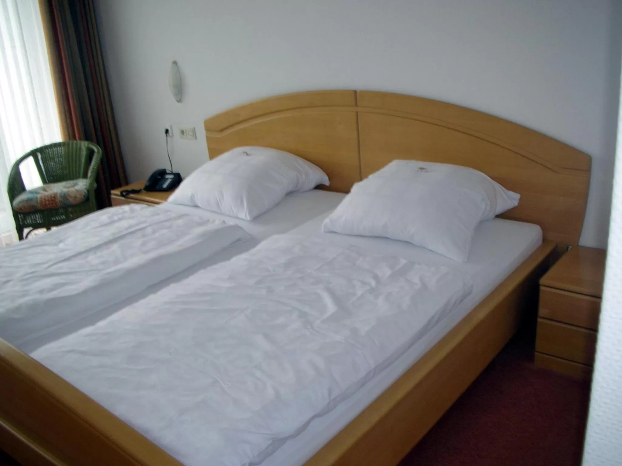 Bed in Heidehotel Hildfeld