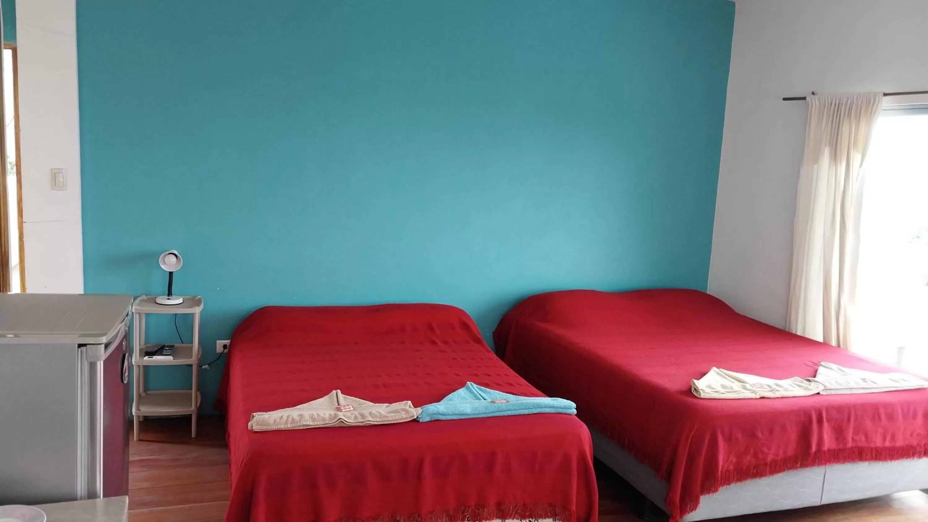 Bed in Hostal Cabañas Don Jorge