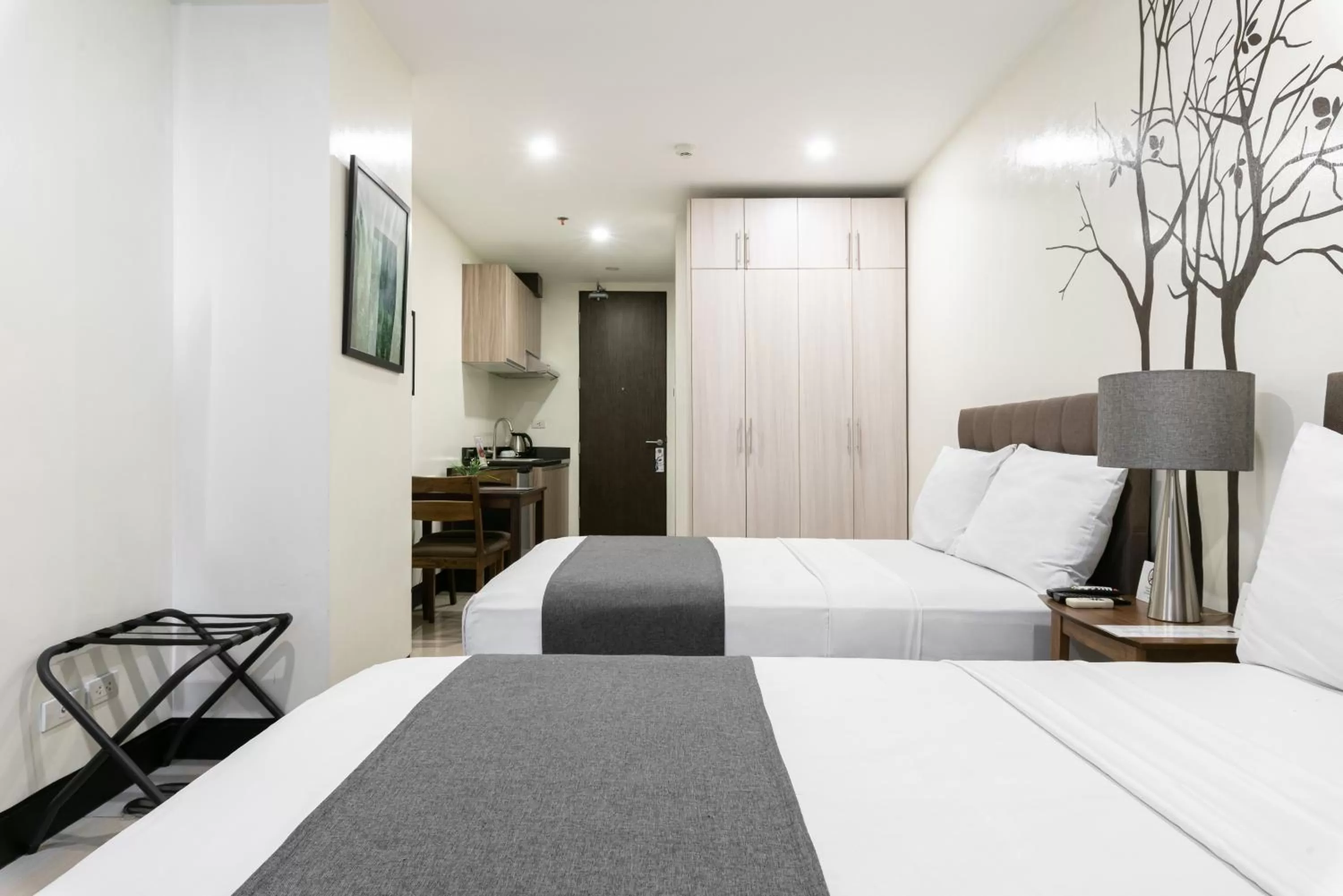 Bedroom, Bed in Artemis Place Makati Hotel