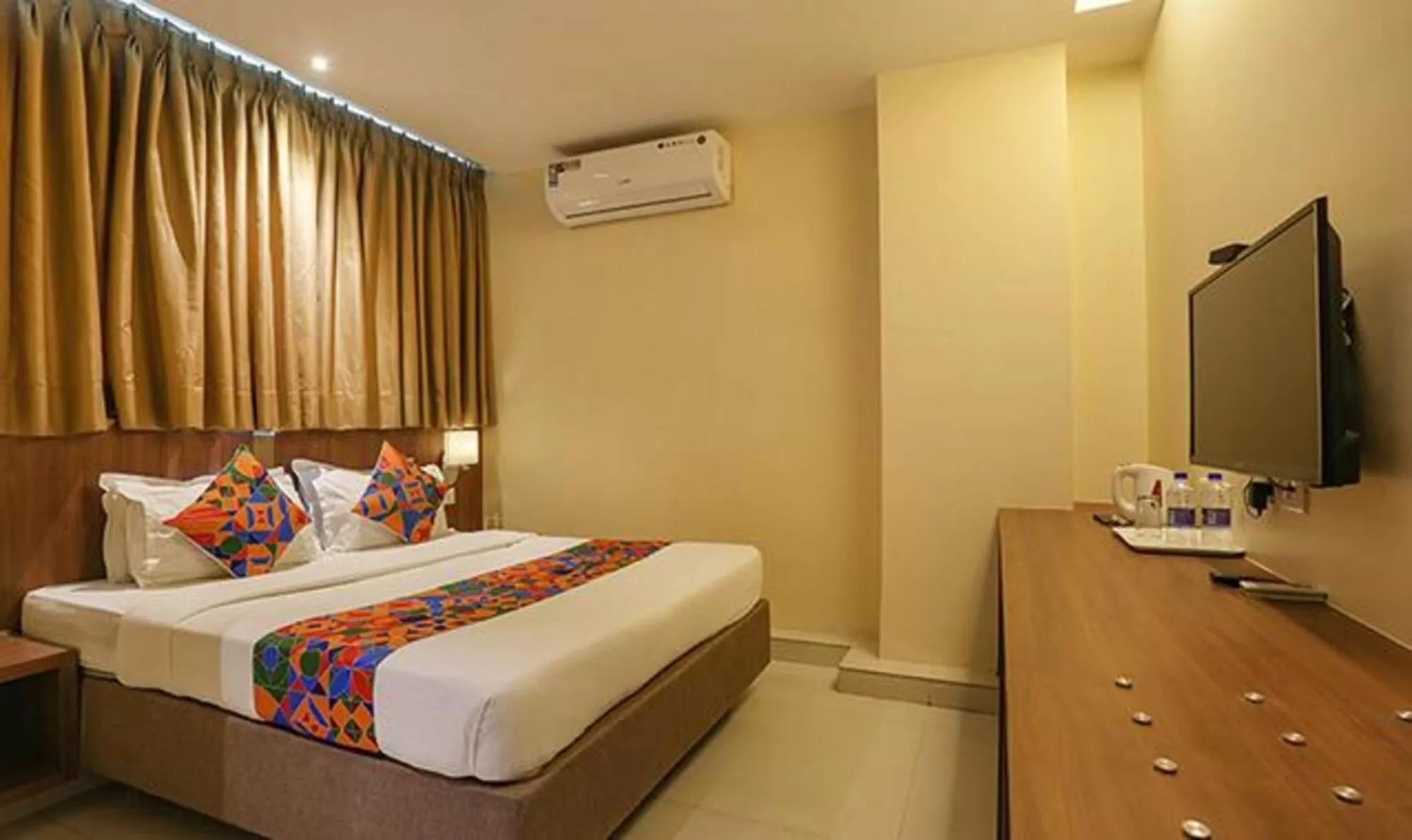 Bed in FabHotel Royal Mumbai International Airport