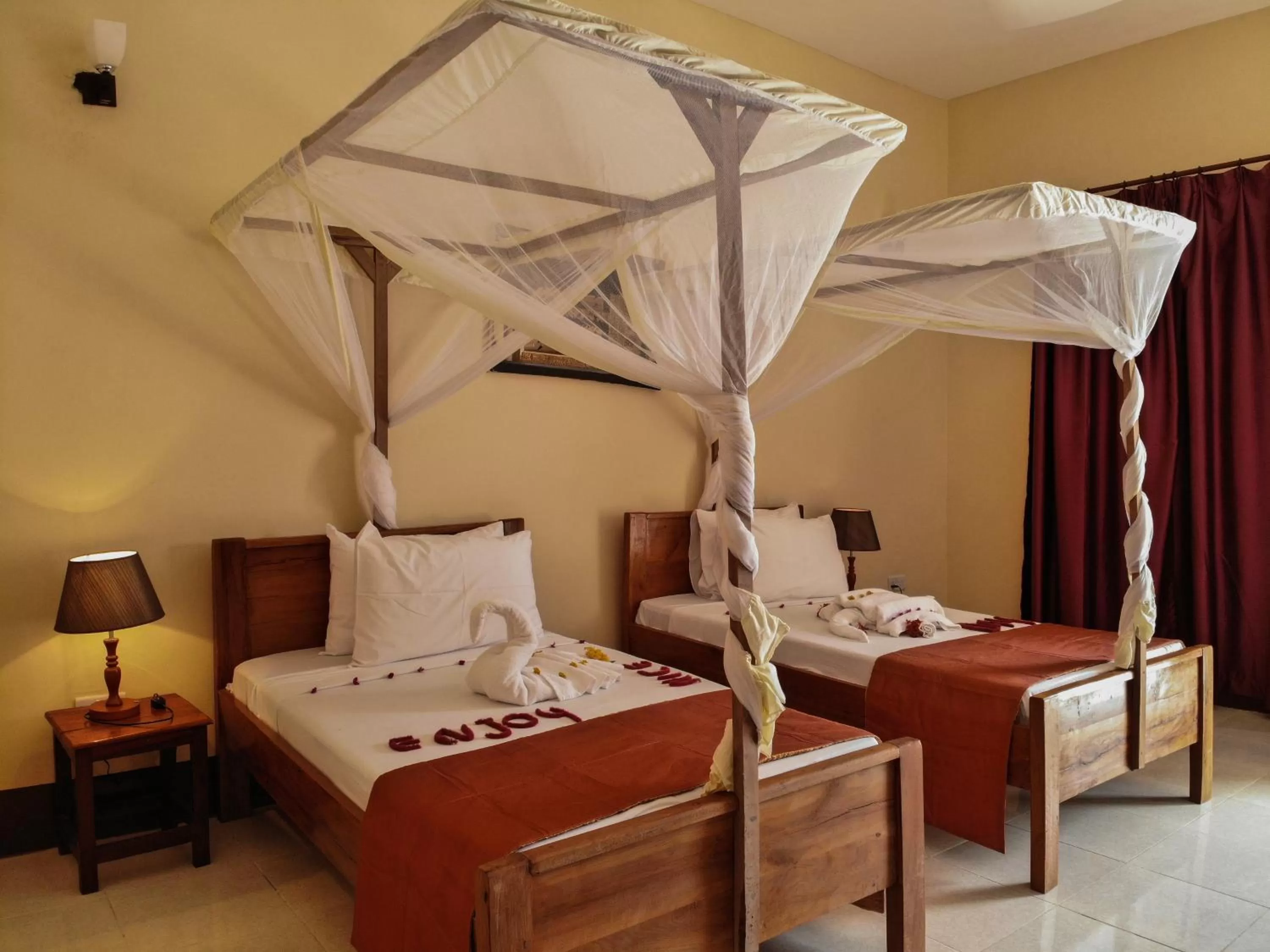 Bed in Amaan Beach Bungalows