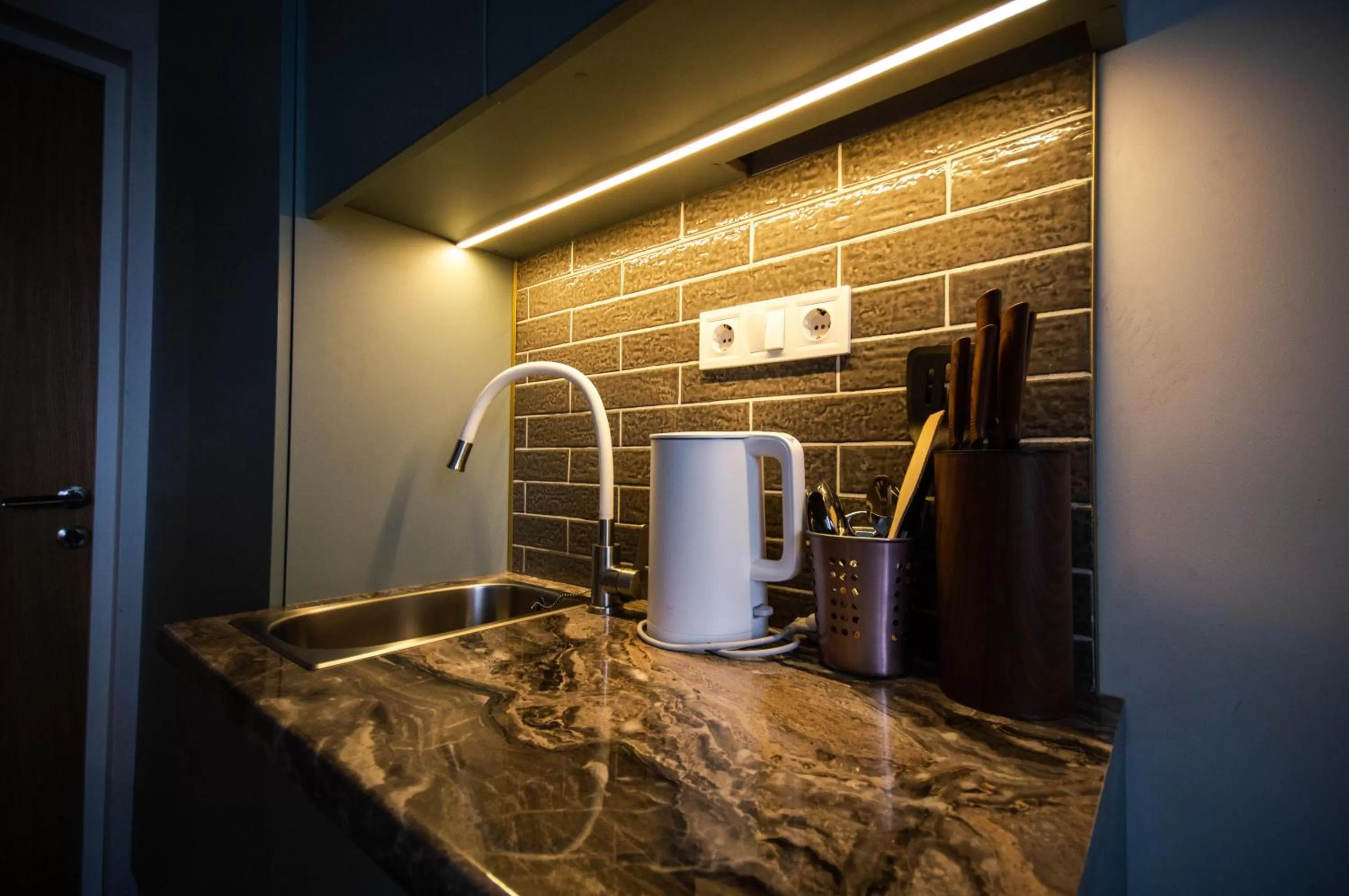 Kitchen or kitchenette in Kyiv Panorama Apartments near Gulliver