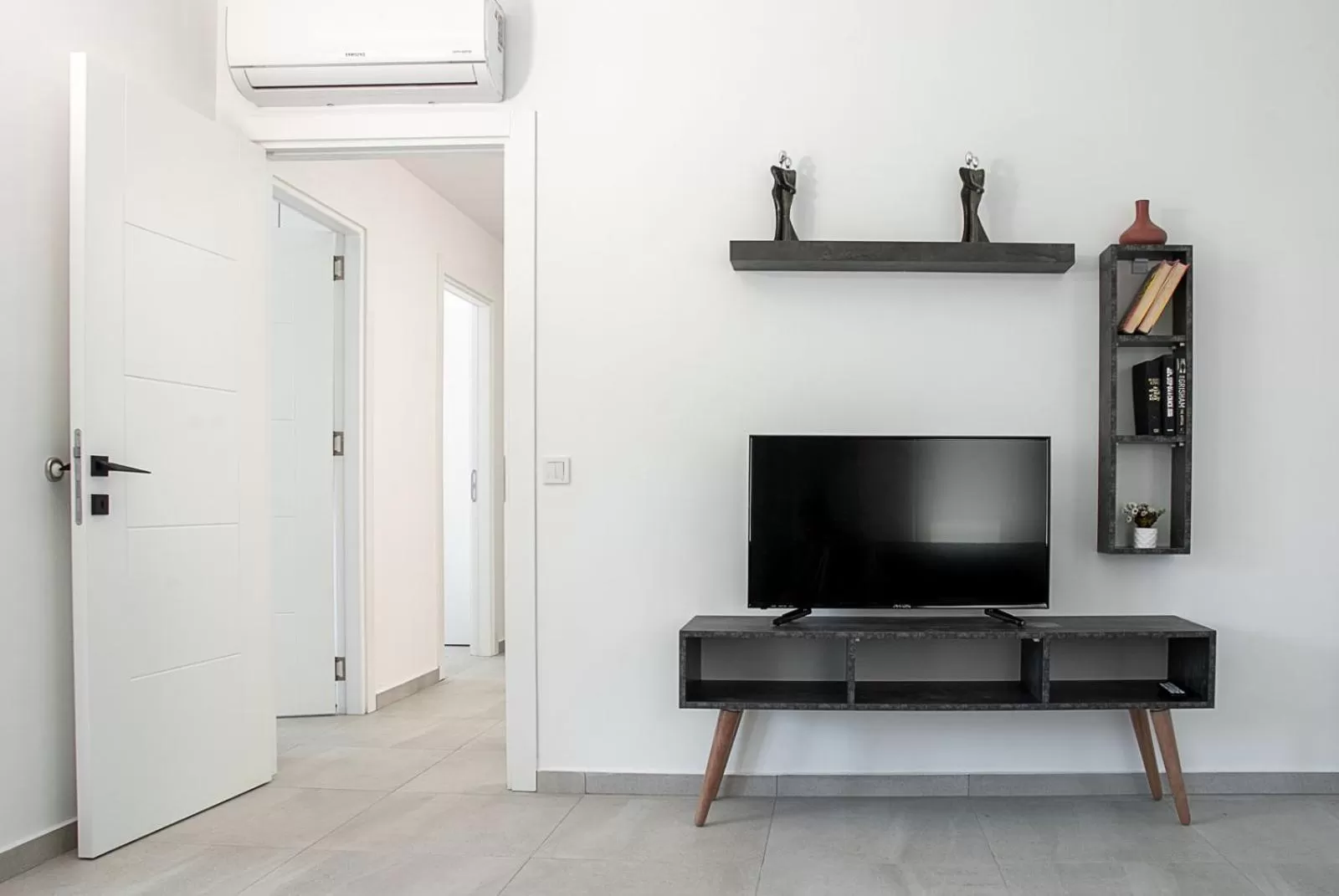 Communal lounge/ TV room in La Moda Aparts