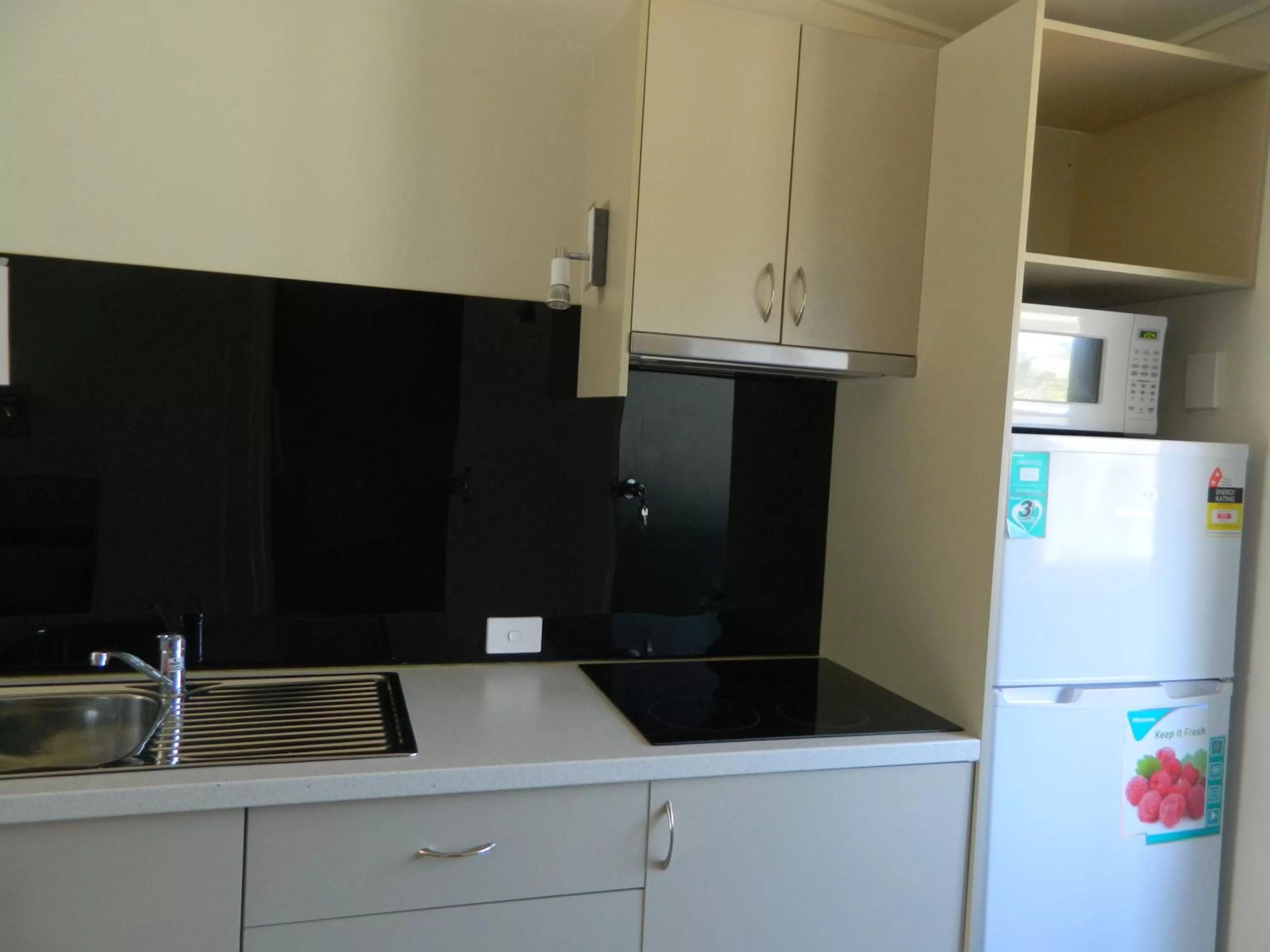 Kitchen or kitchenette in Coachman Motel