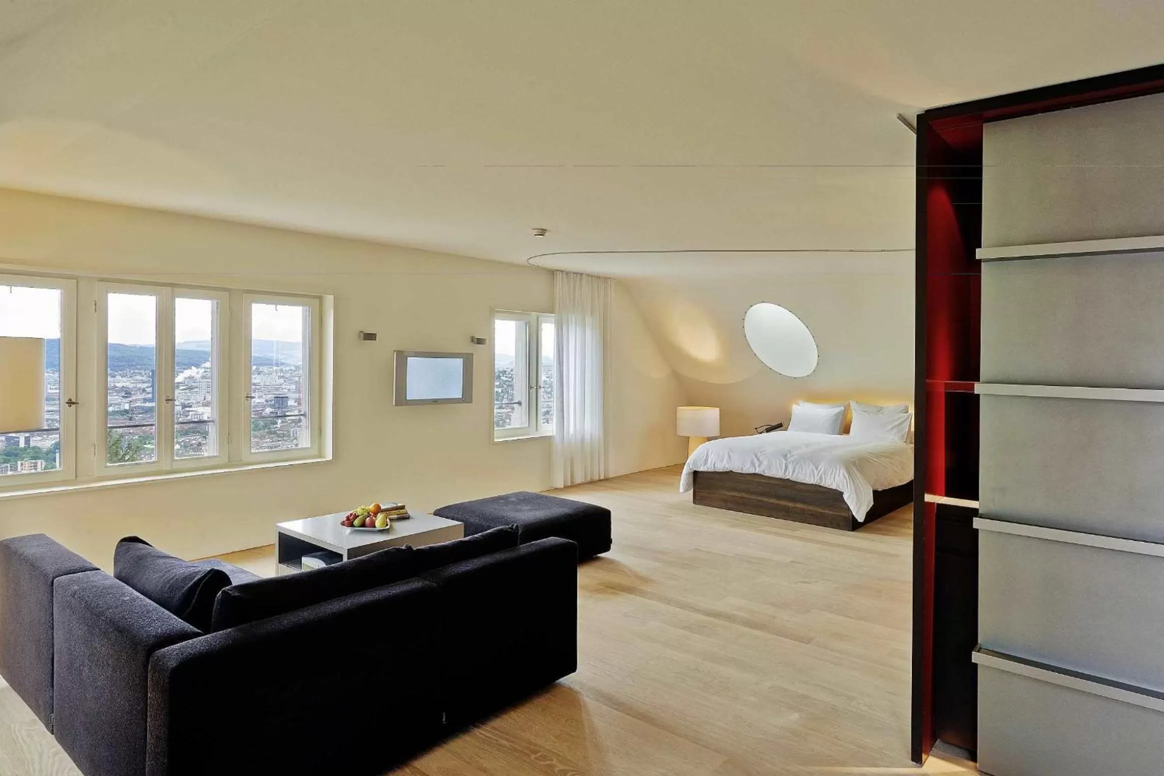 Living room, Bed in Sorell Hotel Rigiblick - Studios & Spa Suites