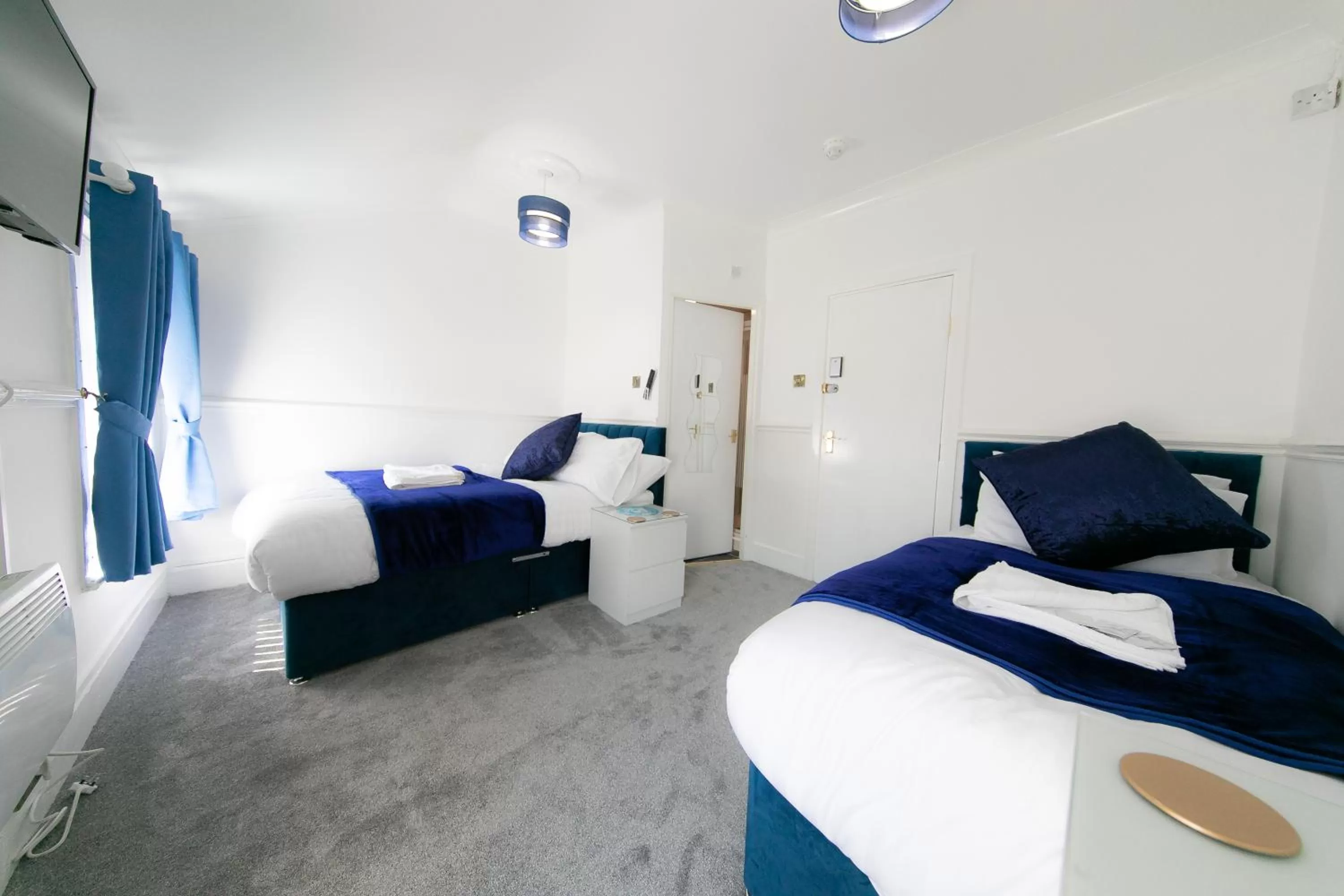 Bed in The New Apollo Hotel